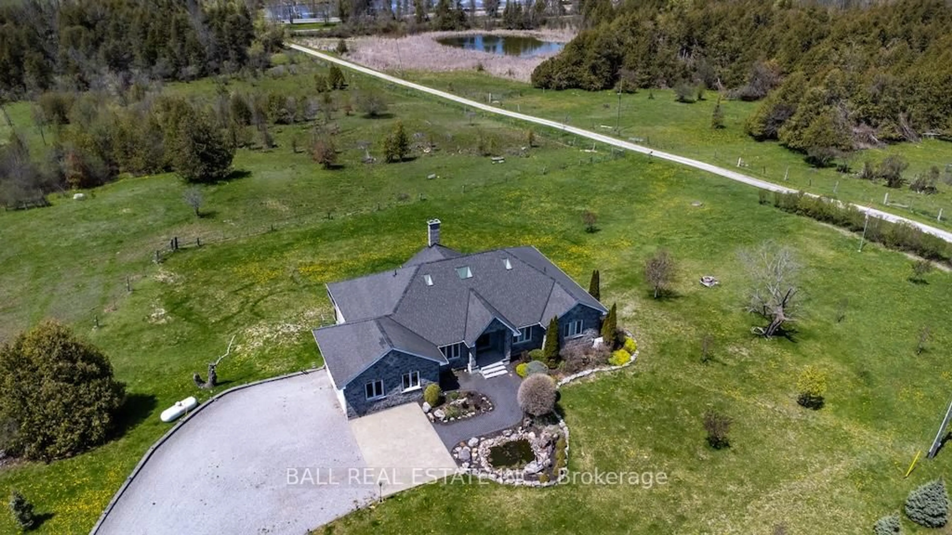 A pic from outside/outdoor area/front of a property/back of a property/a pic from drone, water/lake/river/ocean view for 4131 County Rd 32, Douro-Dummer Ontario K0L 2H0