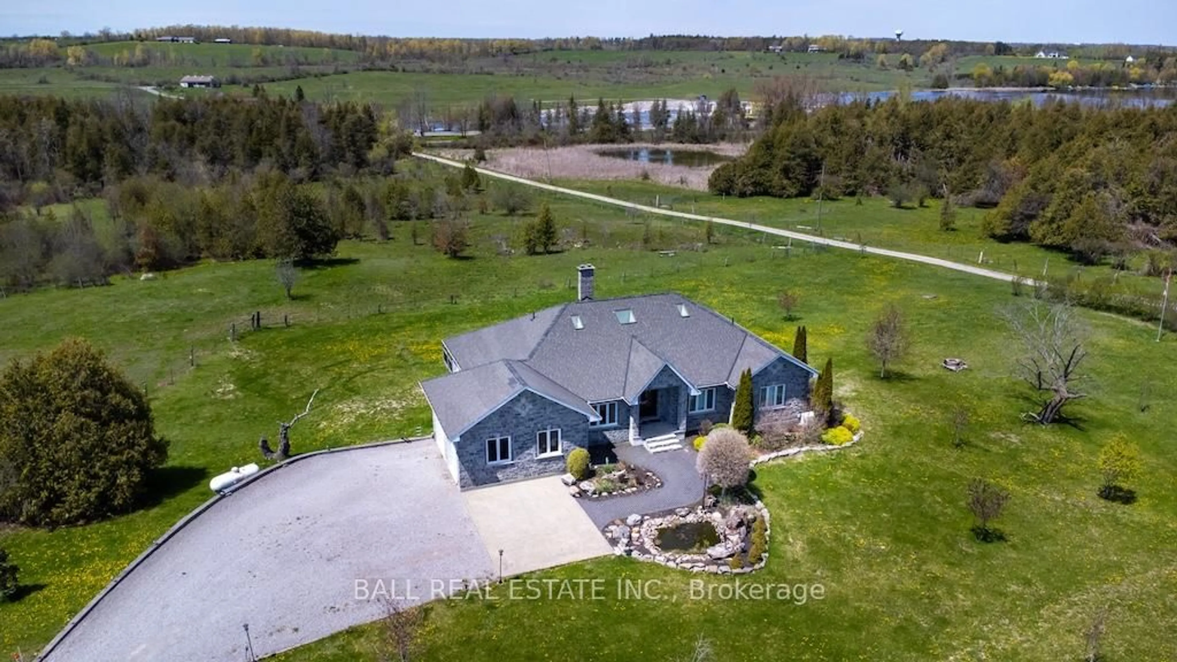 A pic from outside/outdoor area/front of a property/back of a property/a pic from drone, water/lake/river/ocean view for 4131 County Rd 32, Douro-Dummer Ontario K0L 2H0