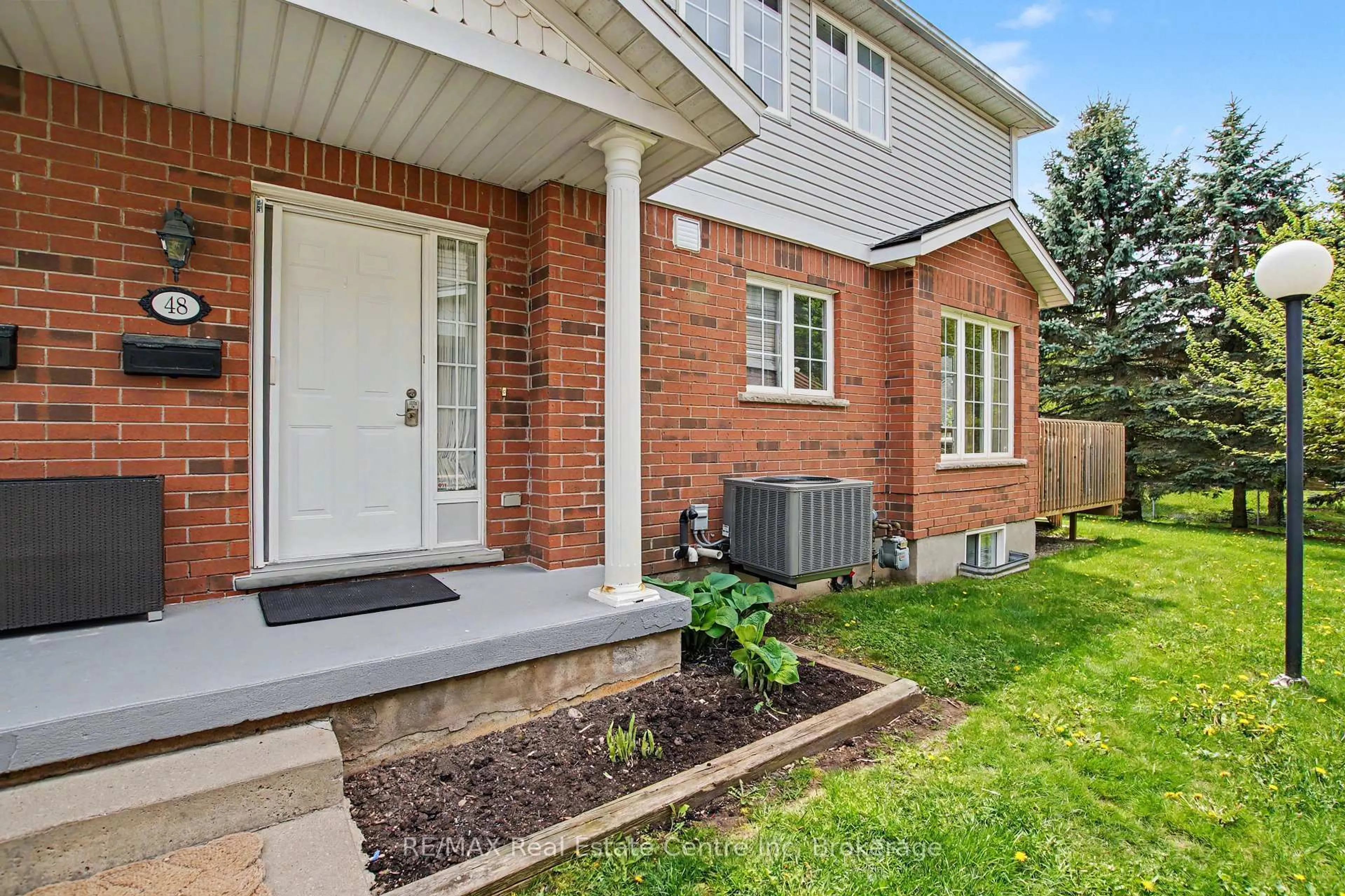 Home with brick exterior material, street for 941 Gordon St #48, Guelph Ontario N1G 4R9