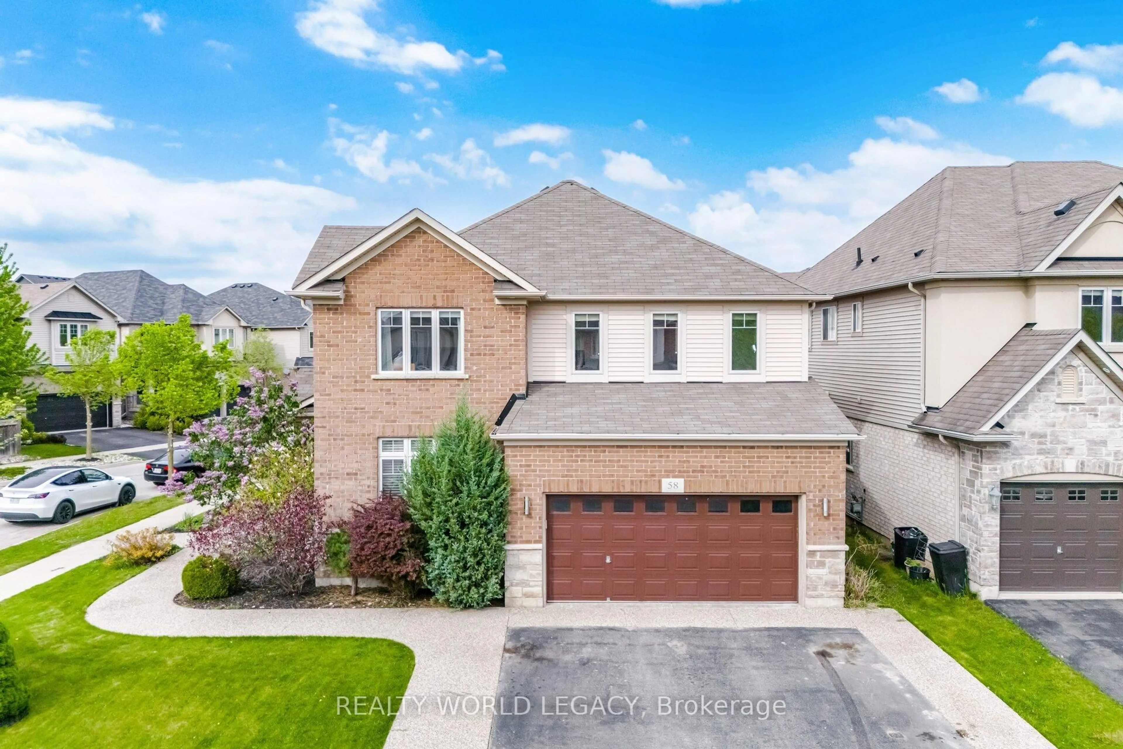 Home with brick exterior material, street for 58 Doon Creek St, Kitchener Ontario N2R 0B6