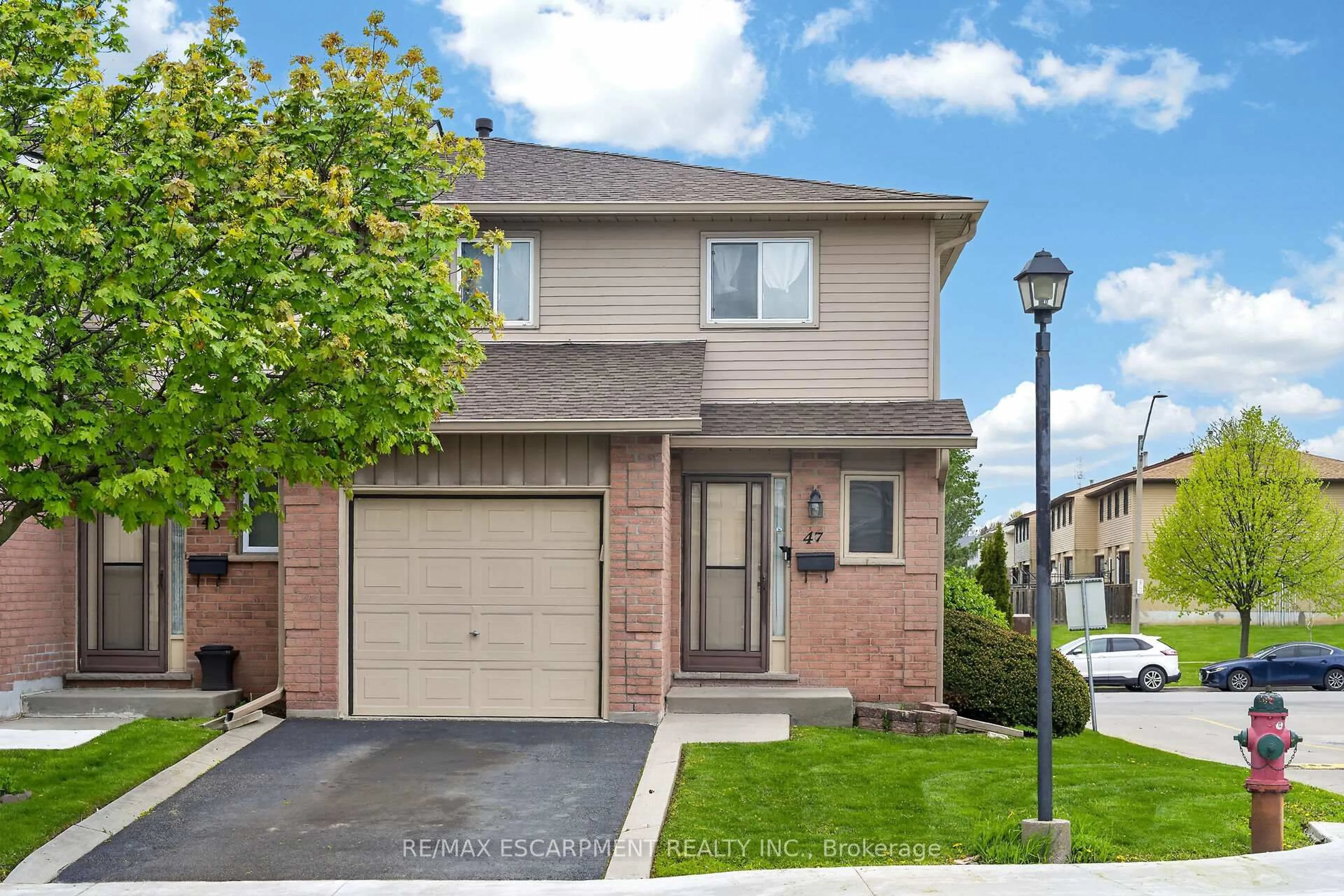 Home with brick exterior material, street for 1675 Upper Gage Ave #47, Hamilton Ontario L8W 3R8