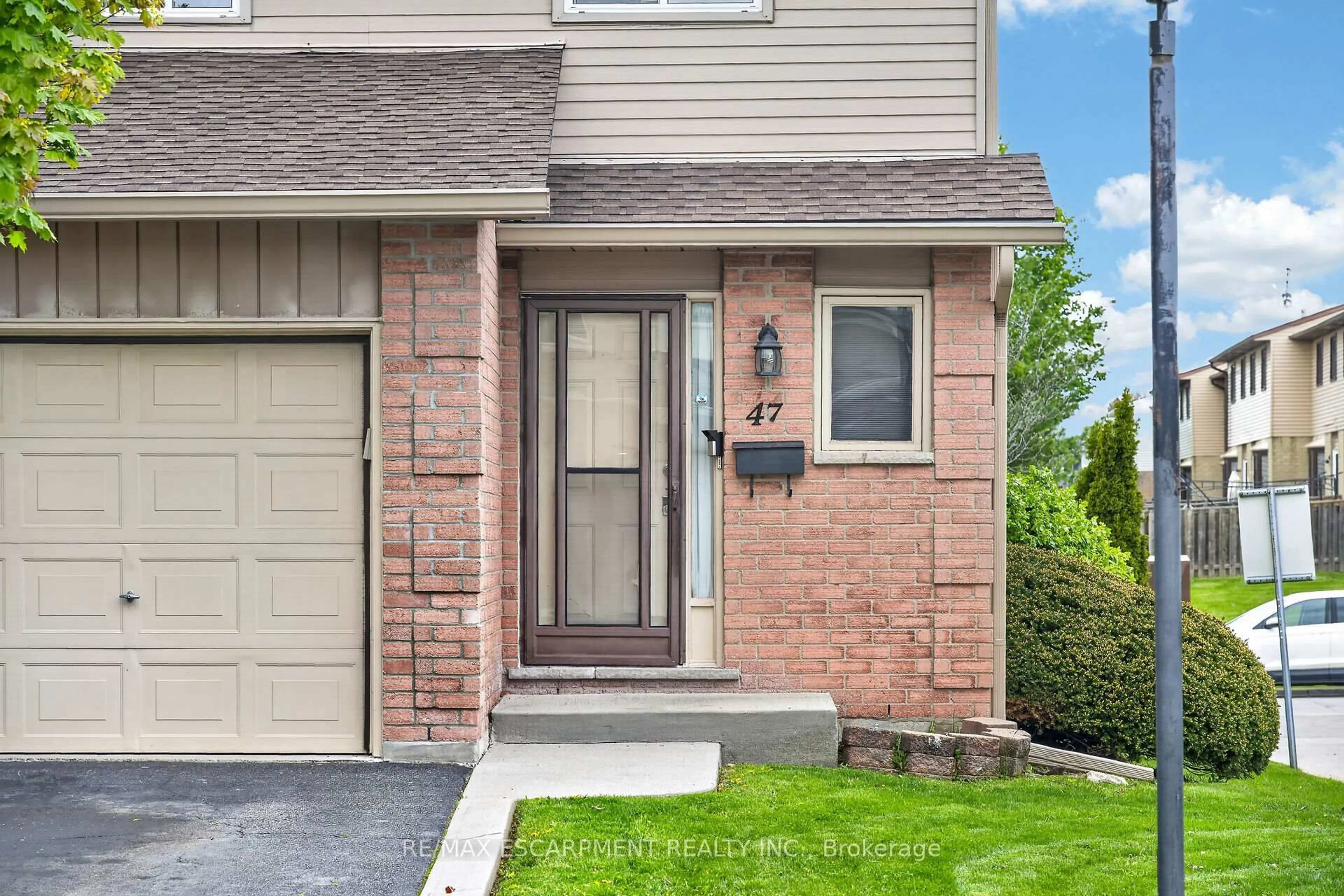 Home with brick exterior material, street for 1675 Upper Gage Ave #47, Hamilton Ontario L8W 3R8