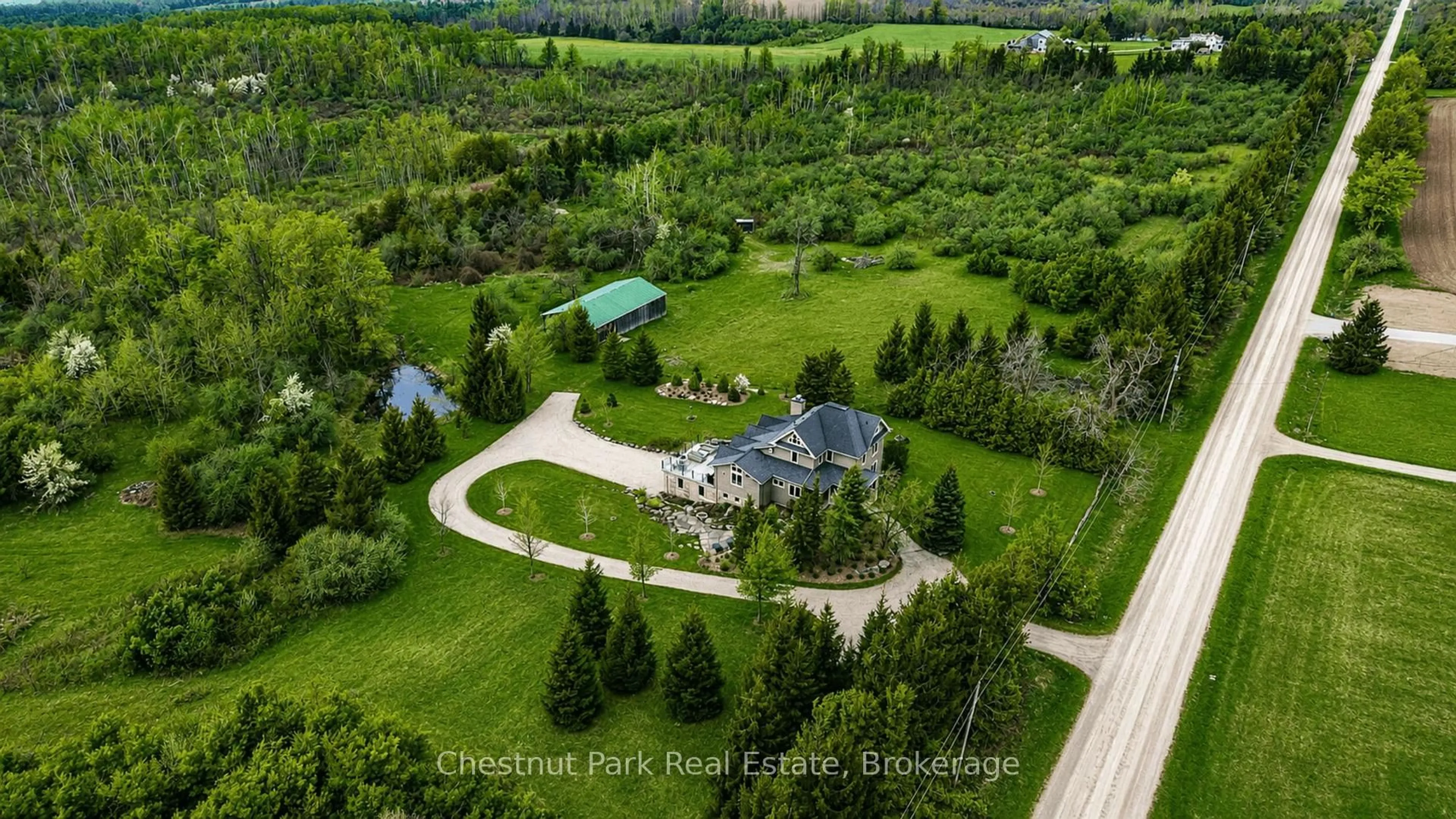 A pic from outside/outdoor area/front of a property/back of a property/a pic from drone, unknown for 758510 2nd Line, Mulmur Ontario L0M 1G0