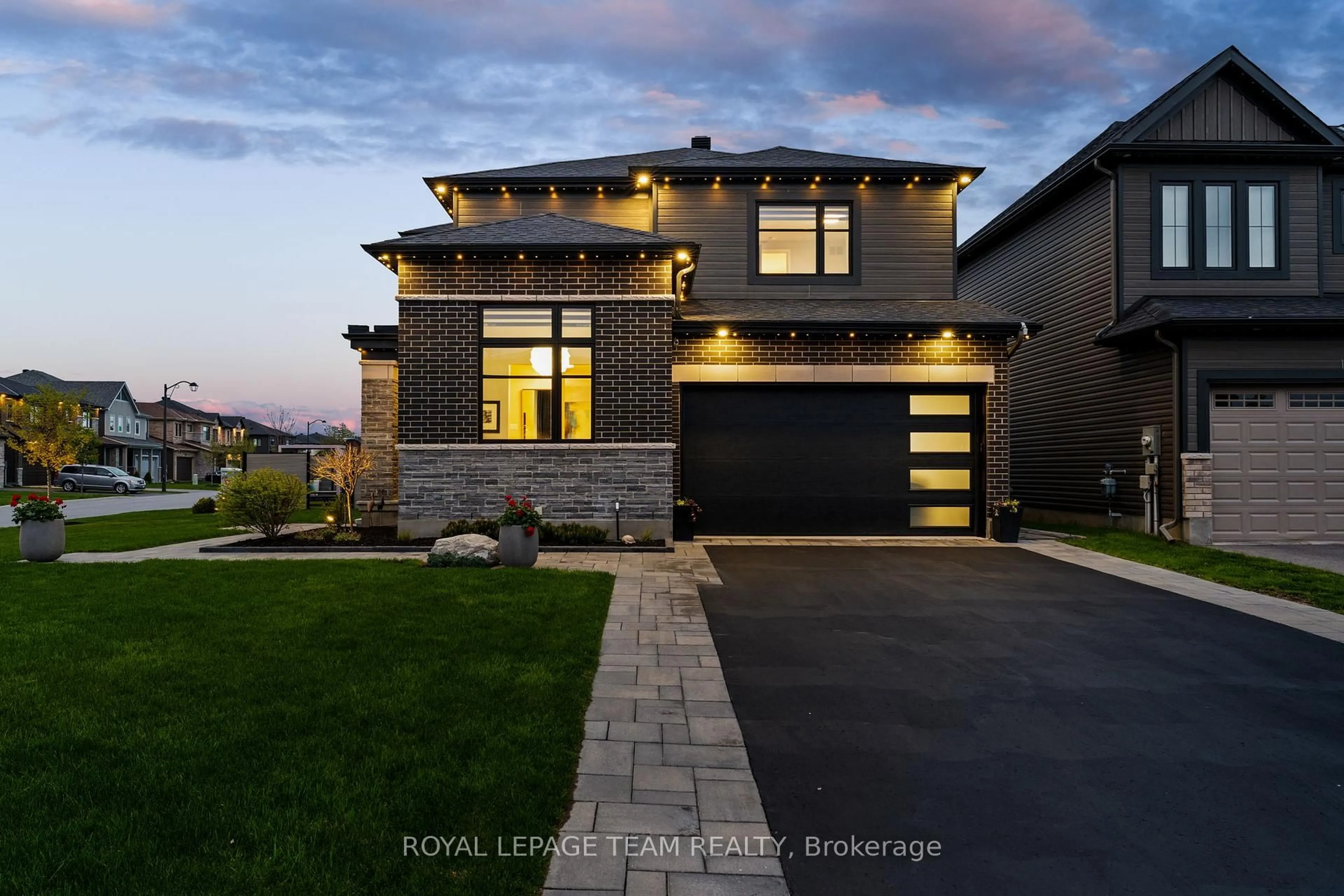 Home with brick exterior material, street for 63 Yacht Terr, Manotick Ontario K4M 0N3