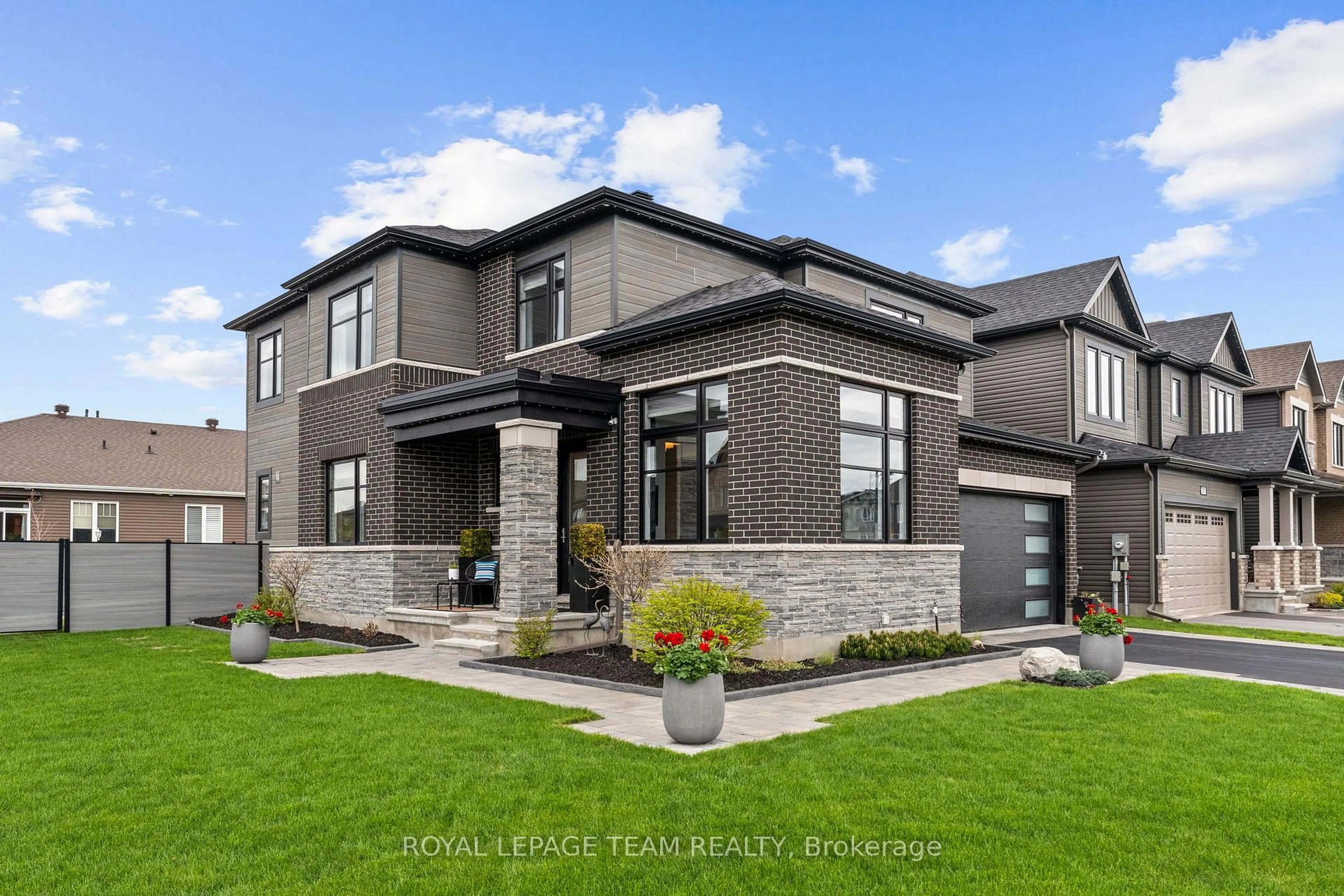 Home with brick exterior material, street for 63 Yacht Terr, Manotick Ontario K4M 0N3