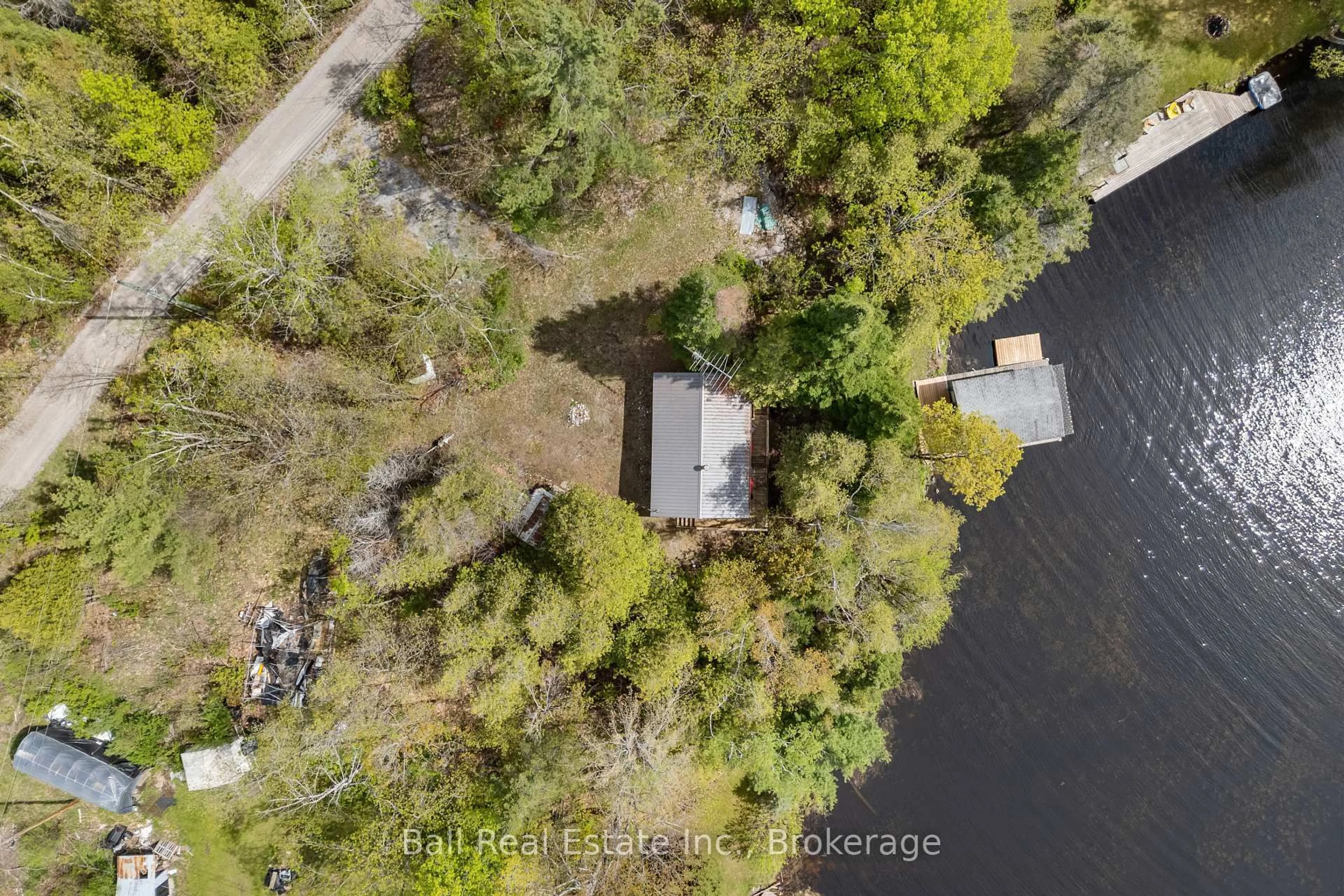A pic from outside/outdoor area/front of a property/back of a property/a pic from drone, water/lake/river/ocean view for 14 Fire Route 94C, Trent Lakes Ontario K0M 1A0