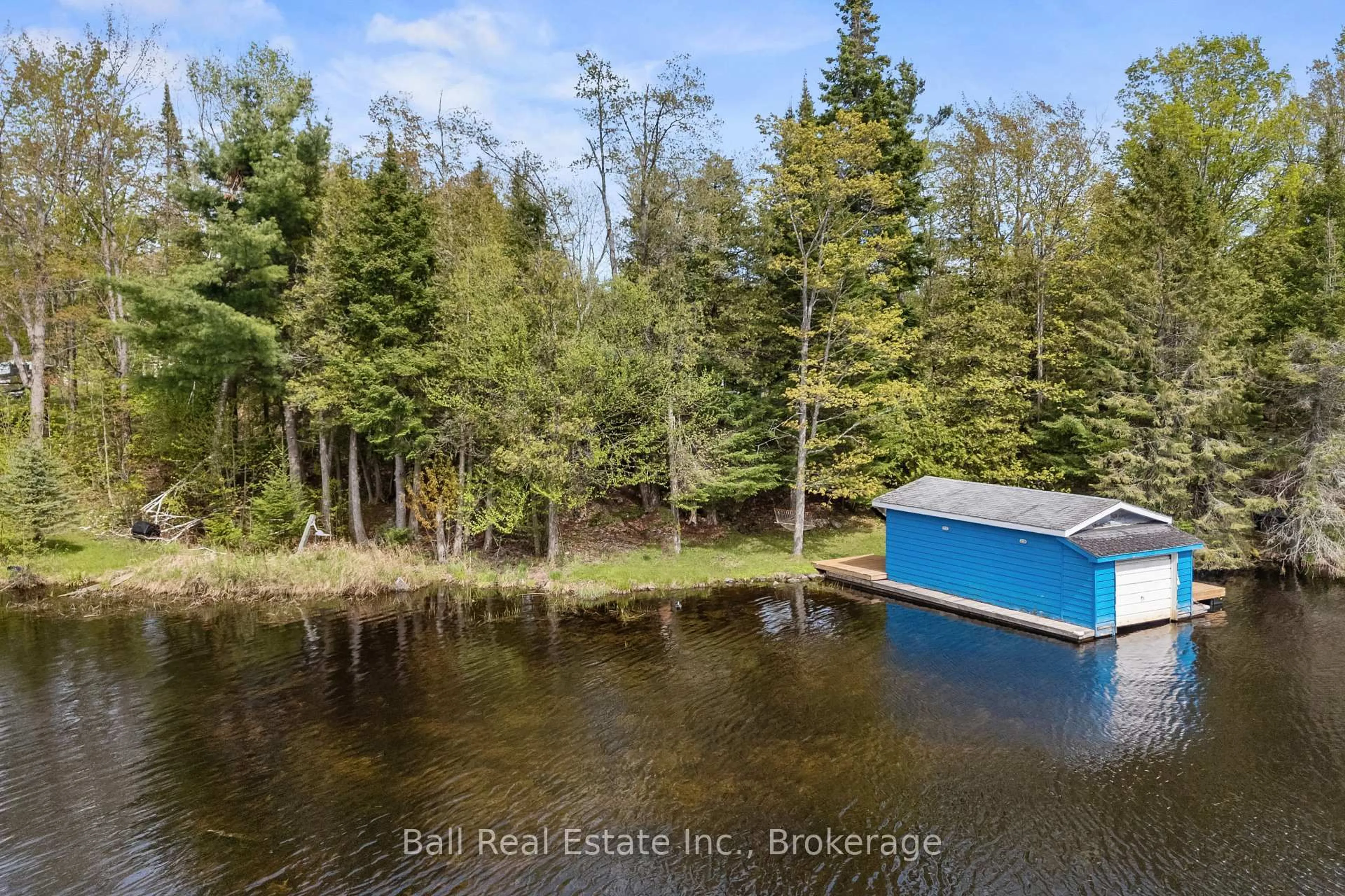 A pic from outside/outdoor area/front of a property/back of a property/a pic from drone, water/lake/river/ocean view for 14 Fire Route 94C, Trent Lakes Ontario K0M 1A0