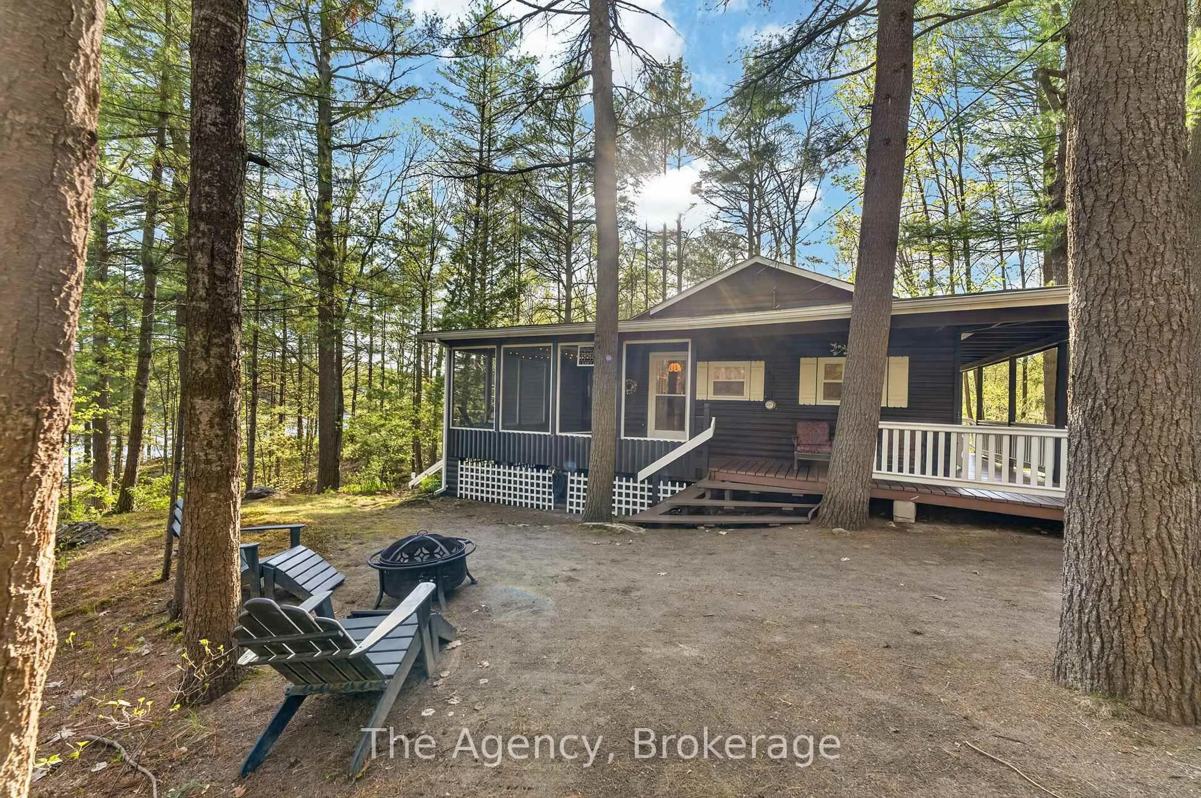 A pic from outside/outdoor area/front of a property/back of a property/a pic from drone, forest/trees view for 21 Redwing Dr, Gravenhurst Ontario P1P 0E5
