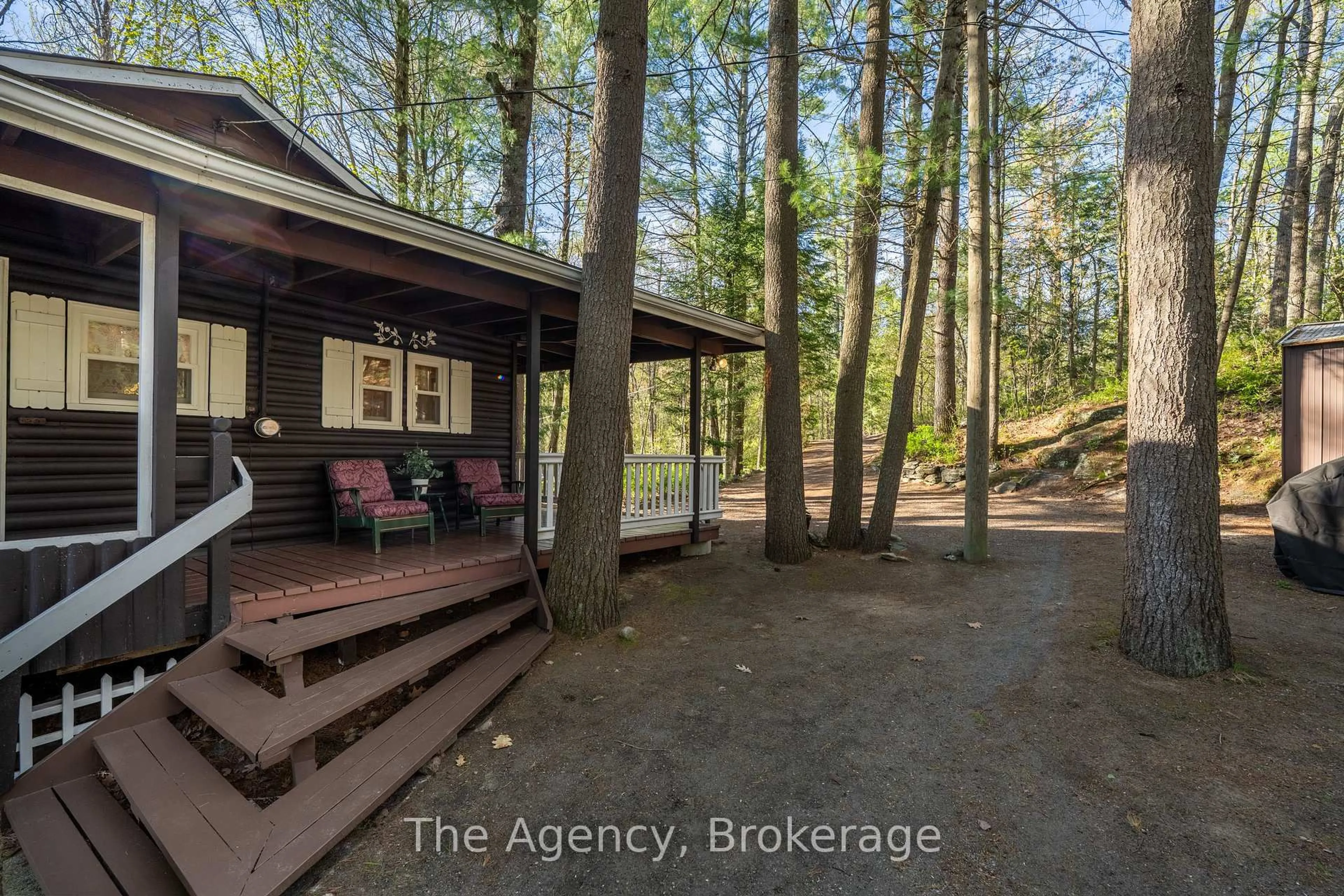 A pic from outside/outdoor area/front of a property/back of a property/a pic from drone, forest/trees view for 21 Redwing Dr, Gravenhurst Ontario P1P 0E5