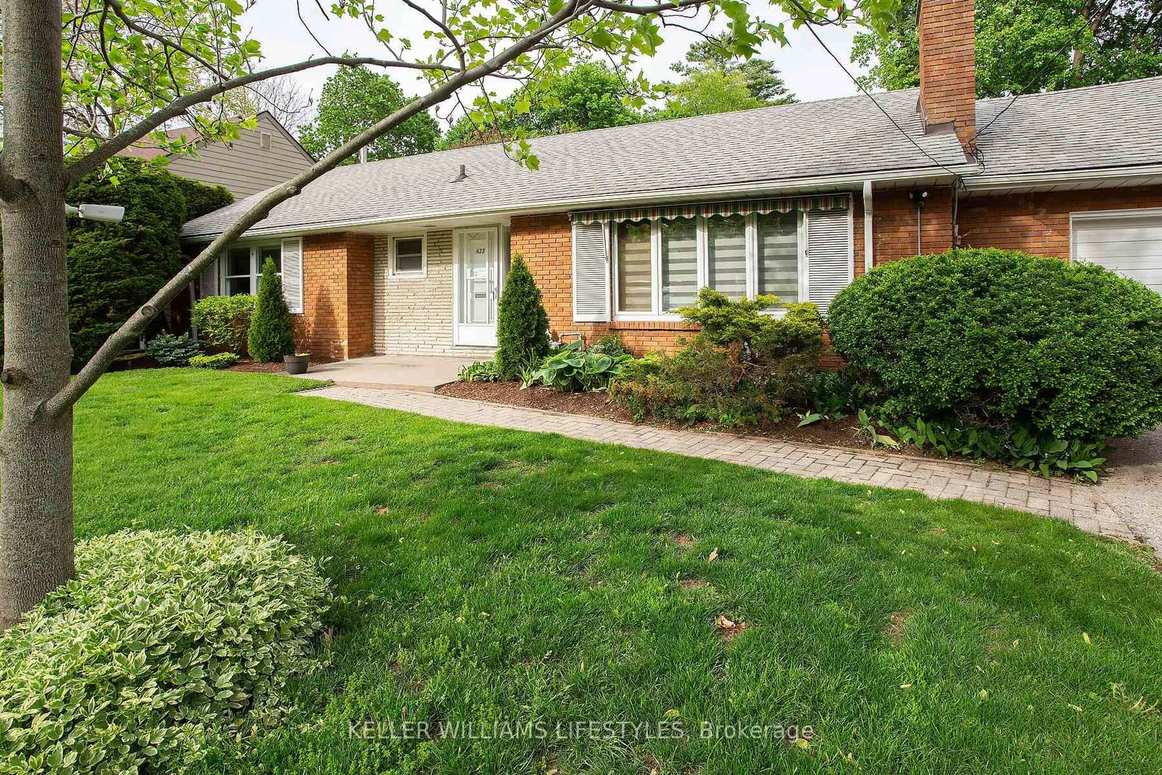 Home with brick exterior material, street for 423 East Mile Rd, London North Ontario N6H 3K4