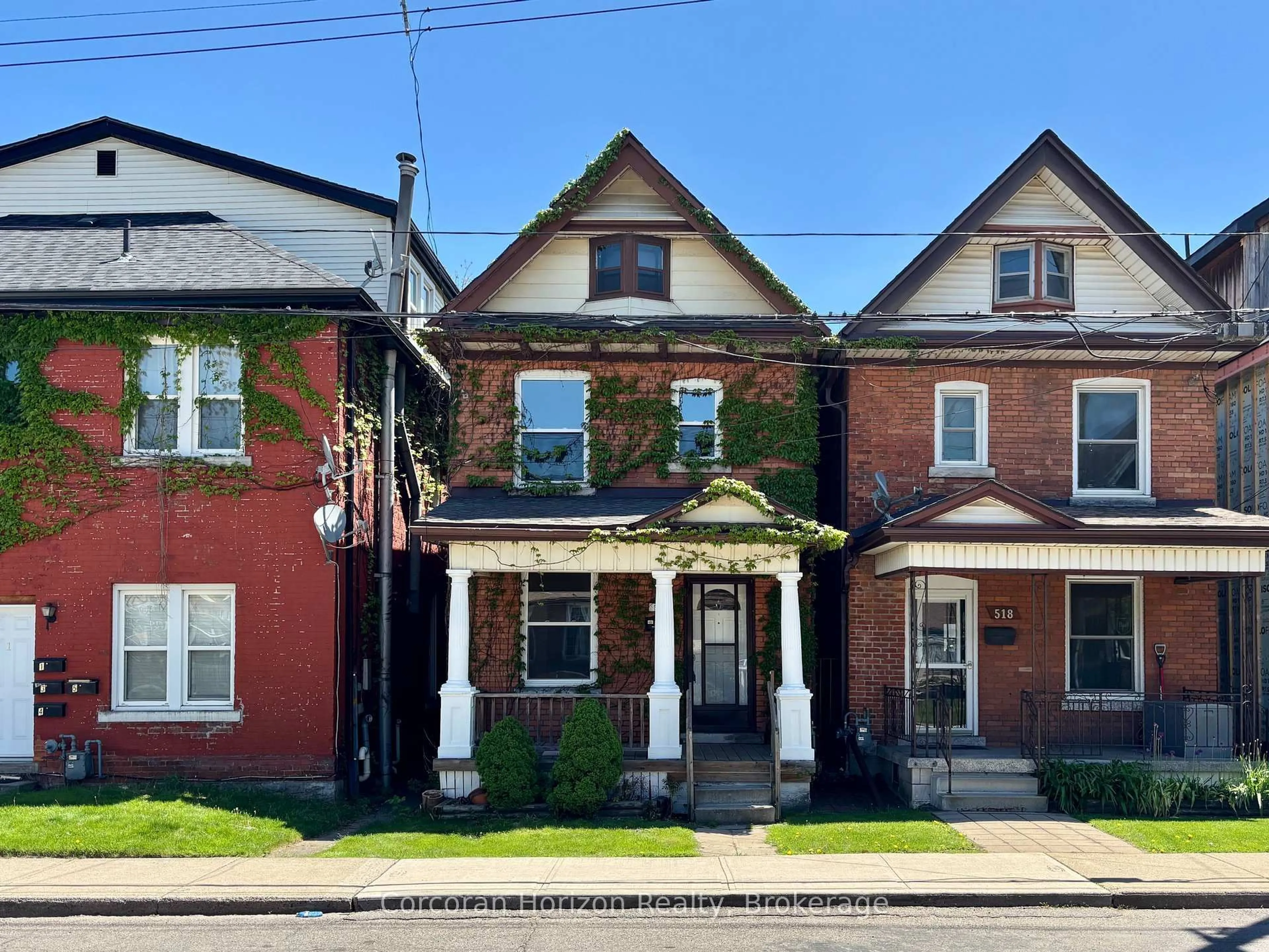 Home with brick exterior material, street for 520 John St, Hamilton Ontario L8L 4R8