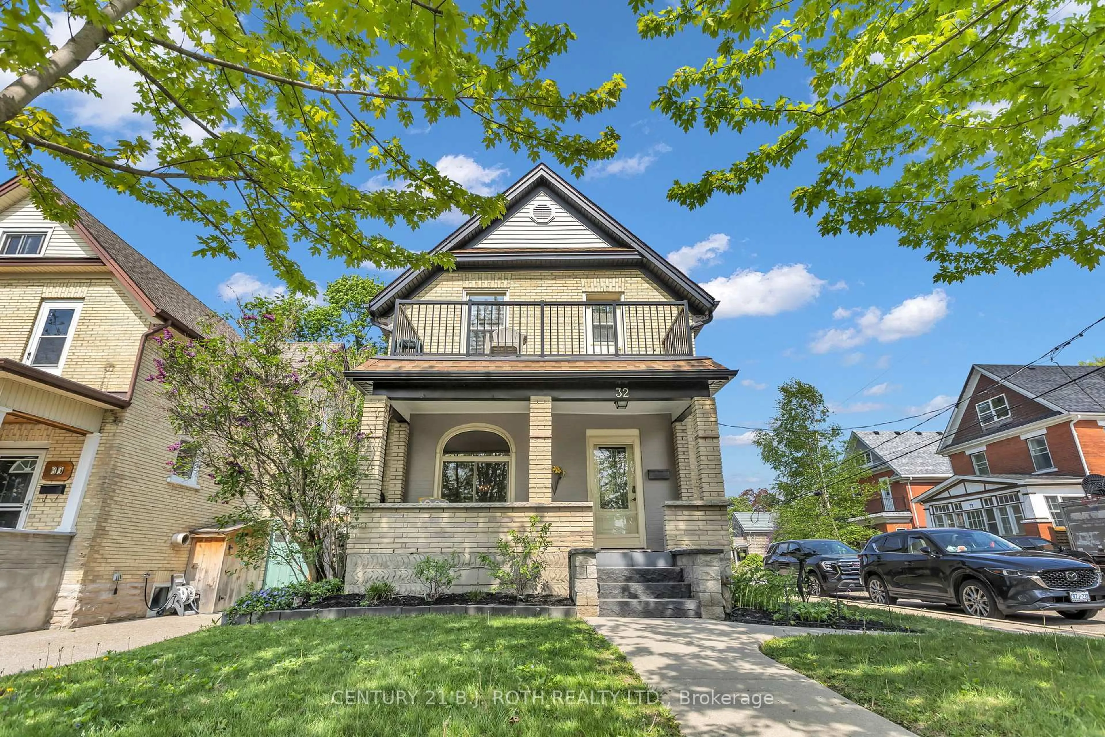 Home with brick exterior material, street for 32 Samuel St, Kitchener Ontario N2H 1P1