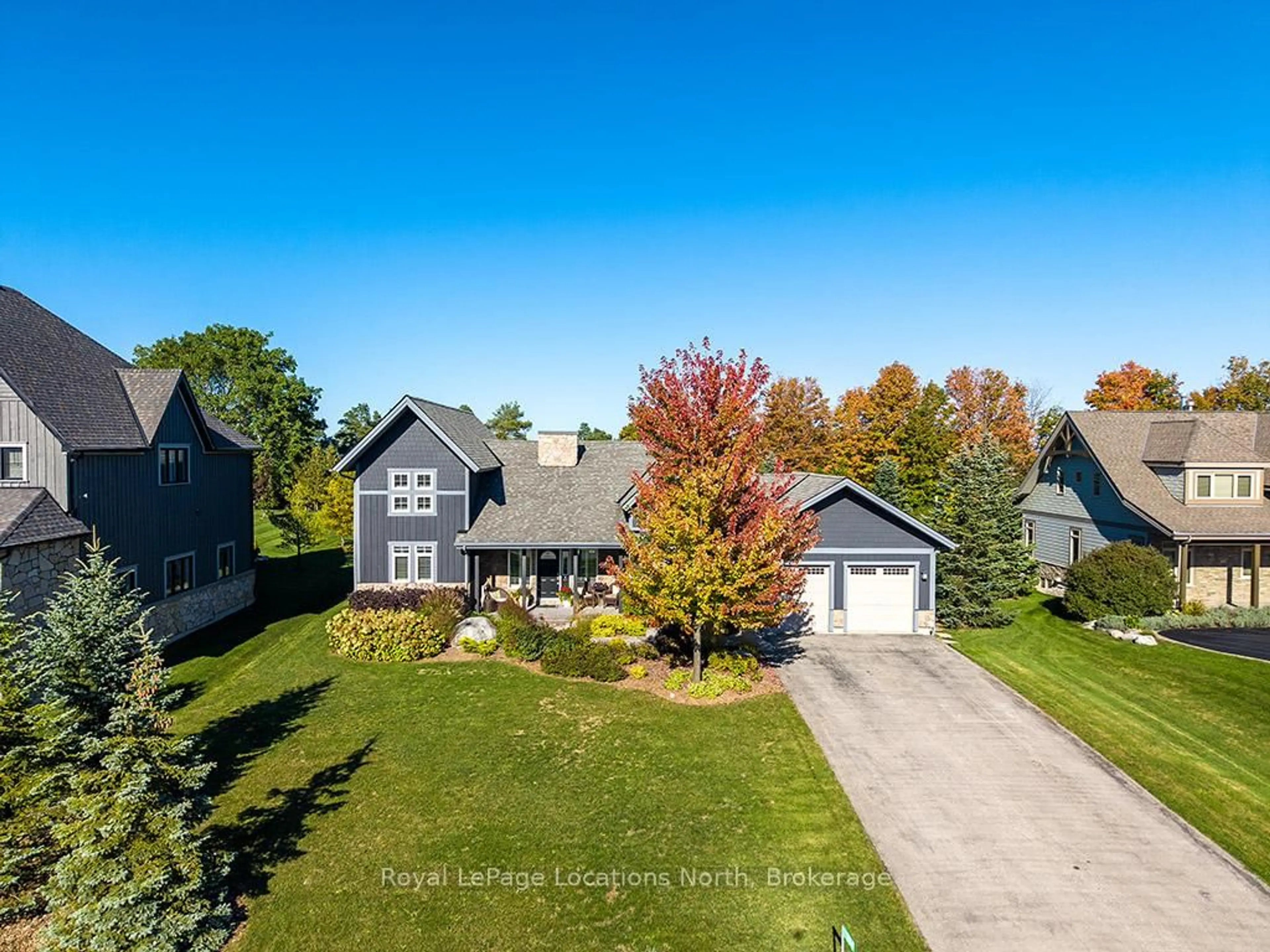 A pic from outside/outdoor area/front of a property/back of a property/a pic from drone, street for 174 High Bluff Lane, Blue Mountains Ontario N0H 2P0