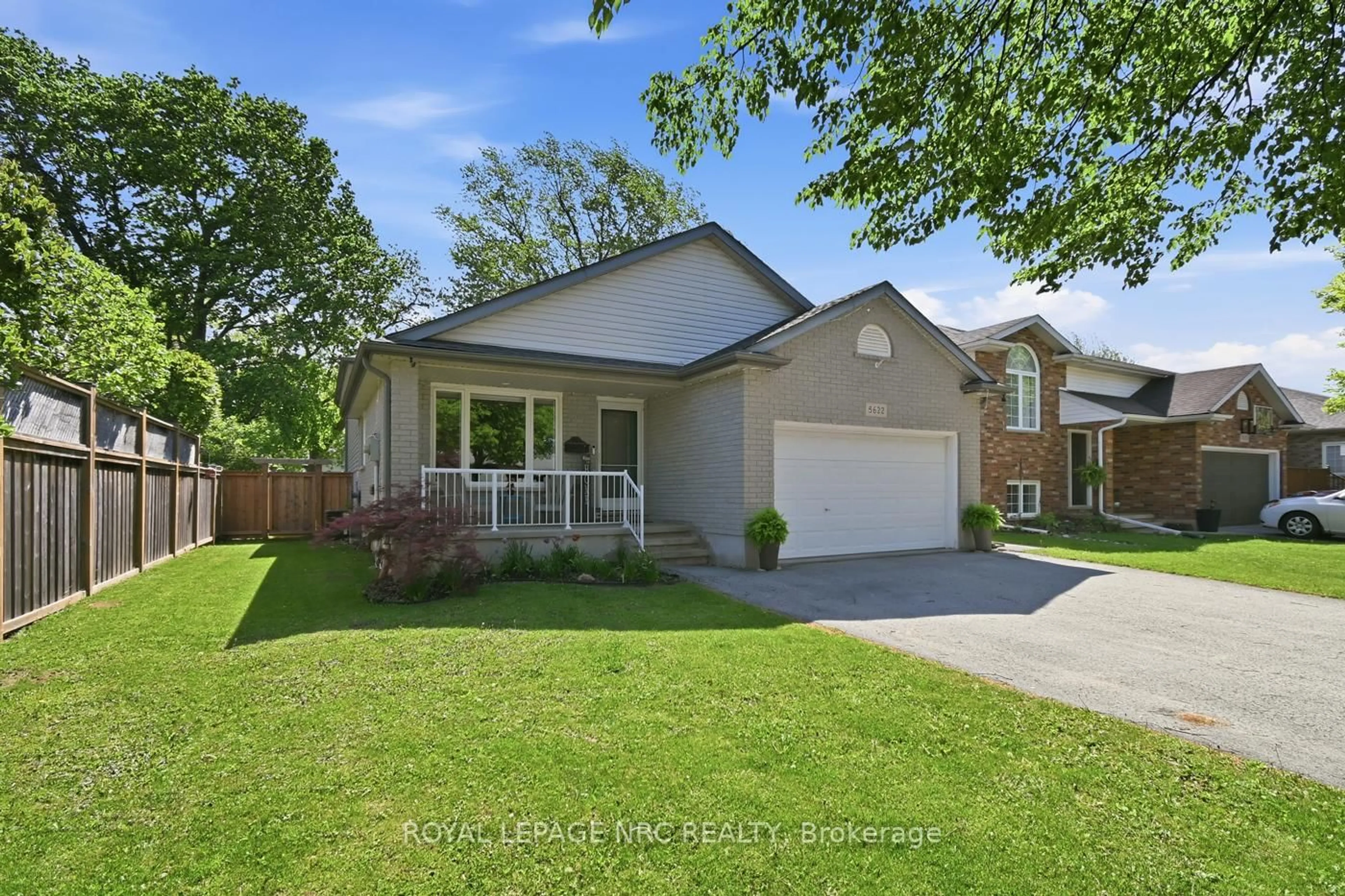 Home with brick exterior material, street for 5622 Magnolia Dr, Niagara Falls Ontario L2H 3J4