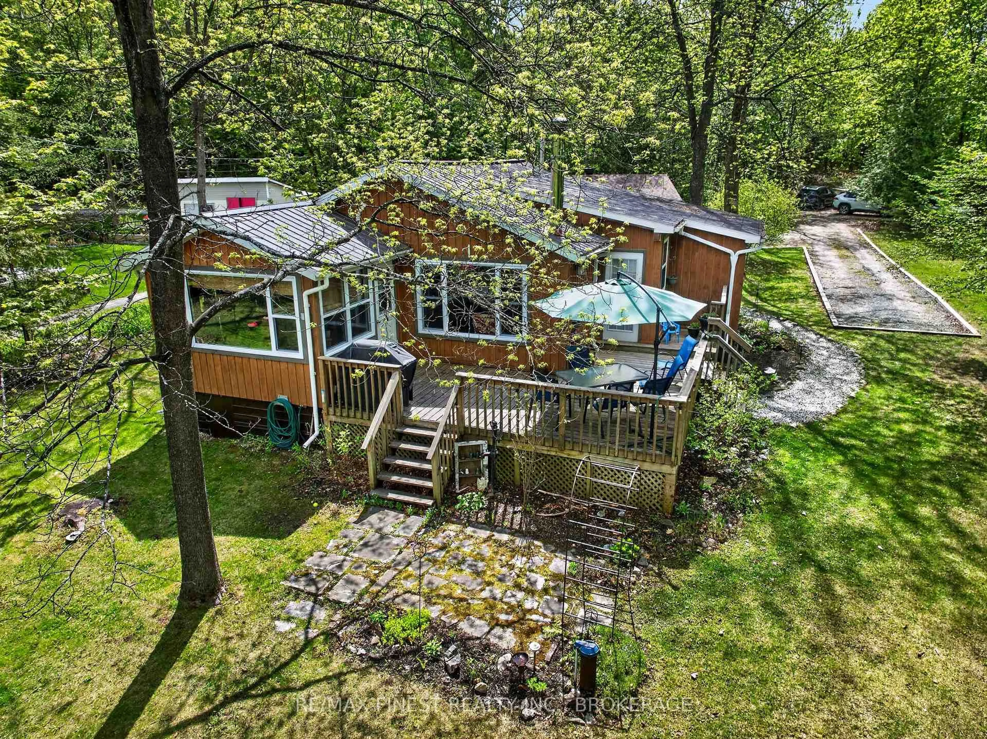 A pic from outside/outdoor area/front of a property/back of a property/a pic from drone, water/lake/river/ocean view for 19 Gull Bay Lane, Maberly Ontario K0H 2B0