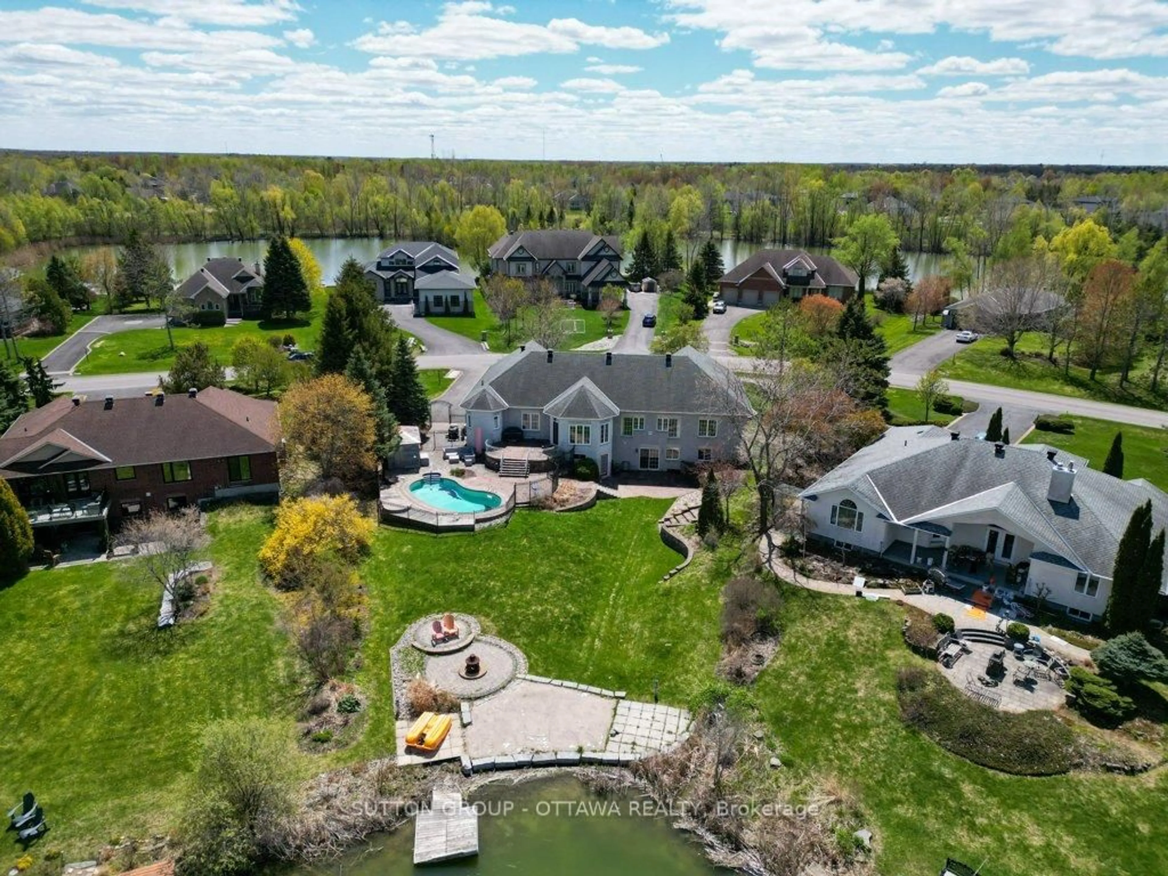 A pic from outside/outdoor area/front of a property/back of a property/a pic from drone, water/lake/river/ocean view for 6881 Lakes Park Dr, Greely Ontario K4P 1P1