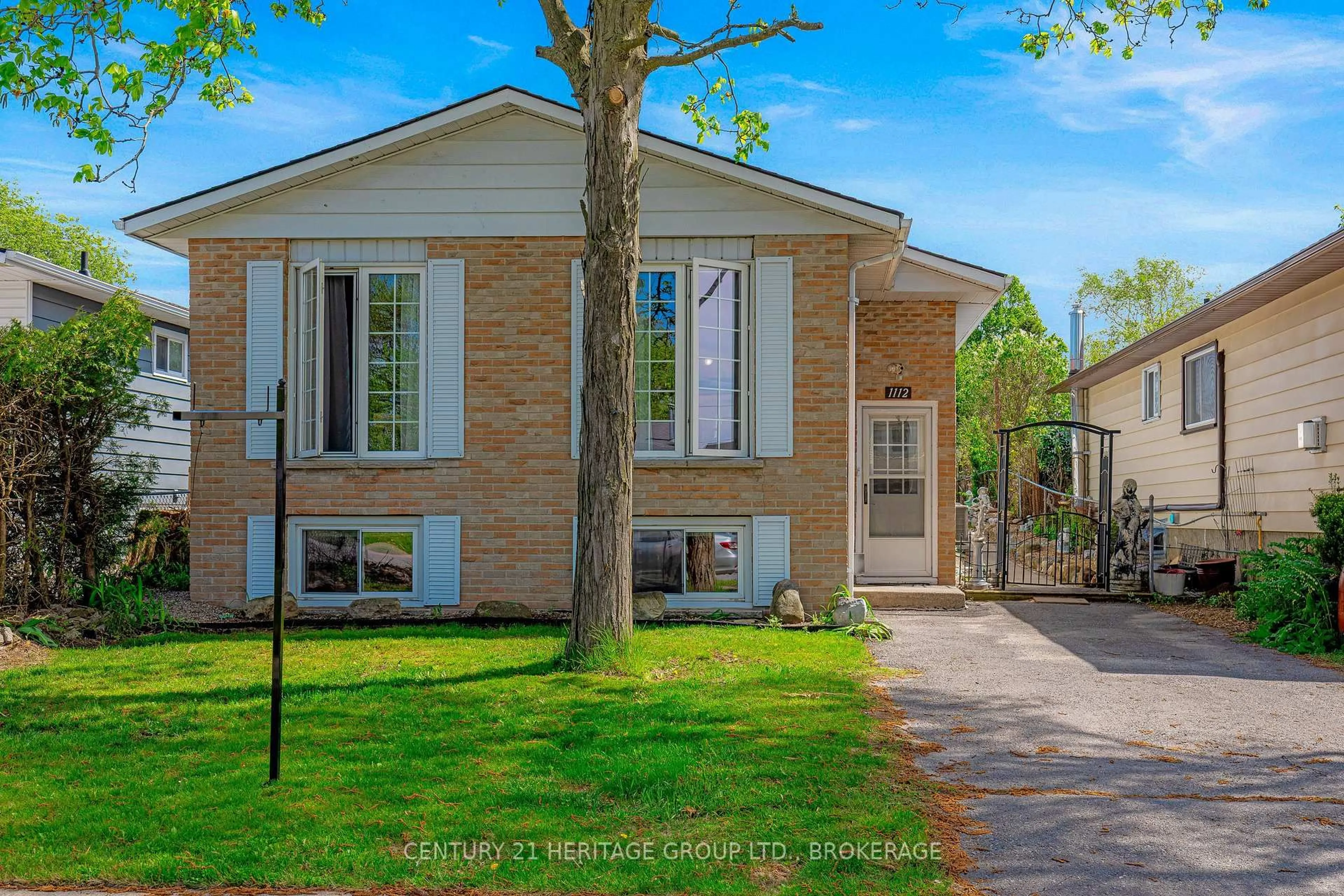 Home with brick exterior material, street for 1112 Basswood Pl, Kingston Ontario K7P 1K6