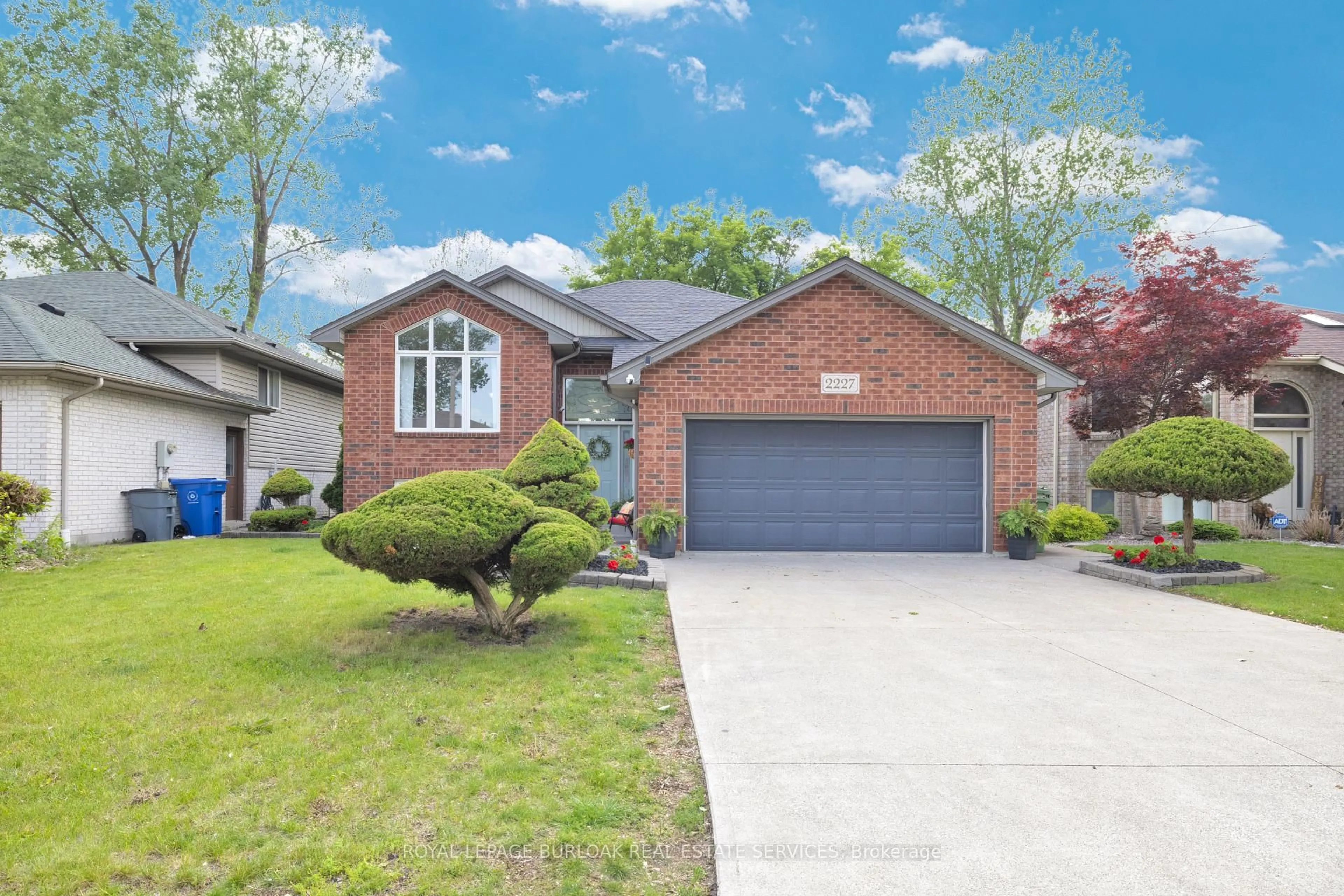 Home with brick exterior material, street for 2227 St Clair Ave, Windsor Ontario N9B 3W4