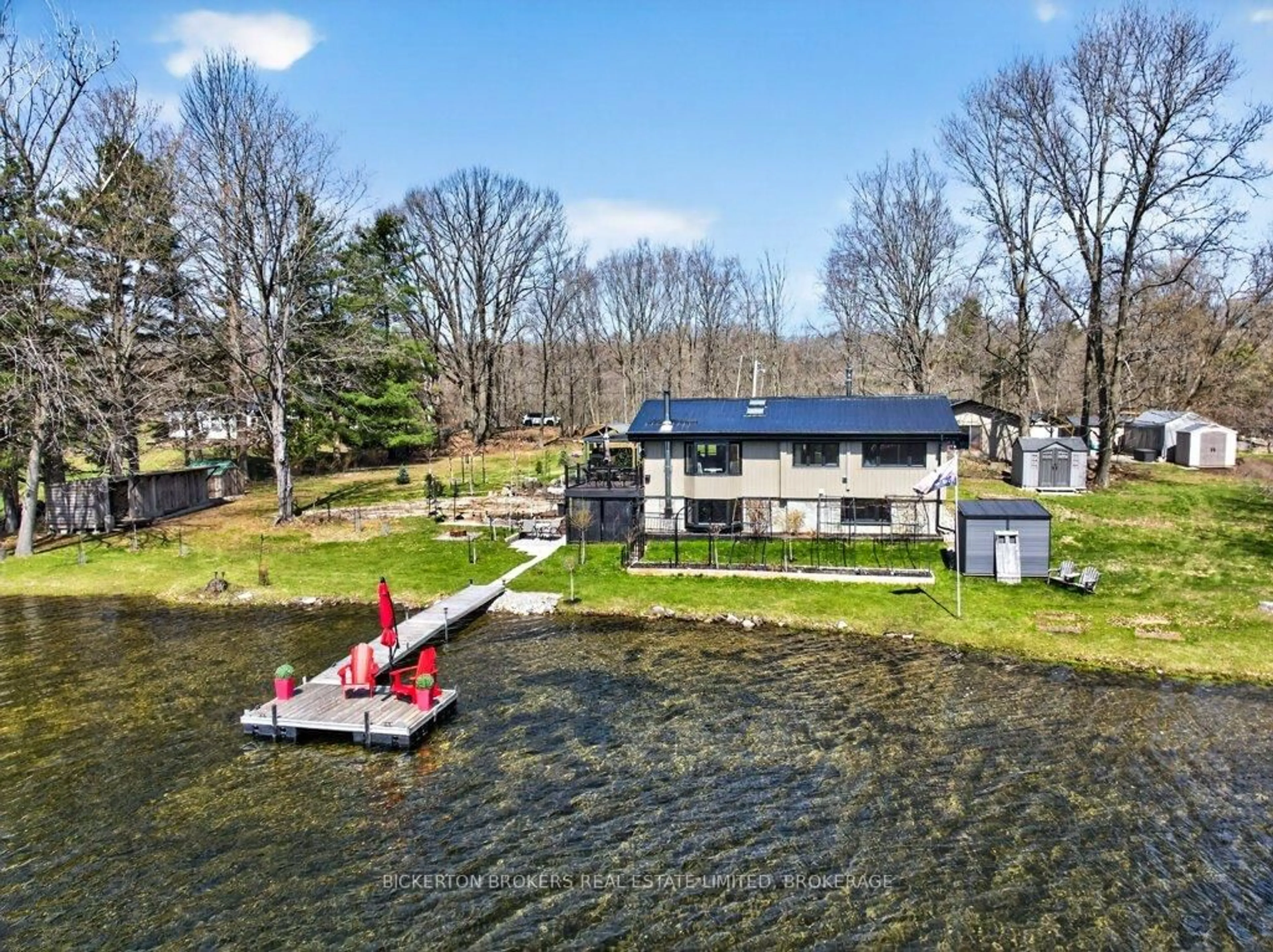 A pic from outside/outdoor area/front of a property/back of a property/a pic from drone, water/lake/river/ocean view for 1927 Hogan Rd, Perth Road Ontario K0H 2L0