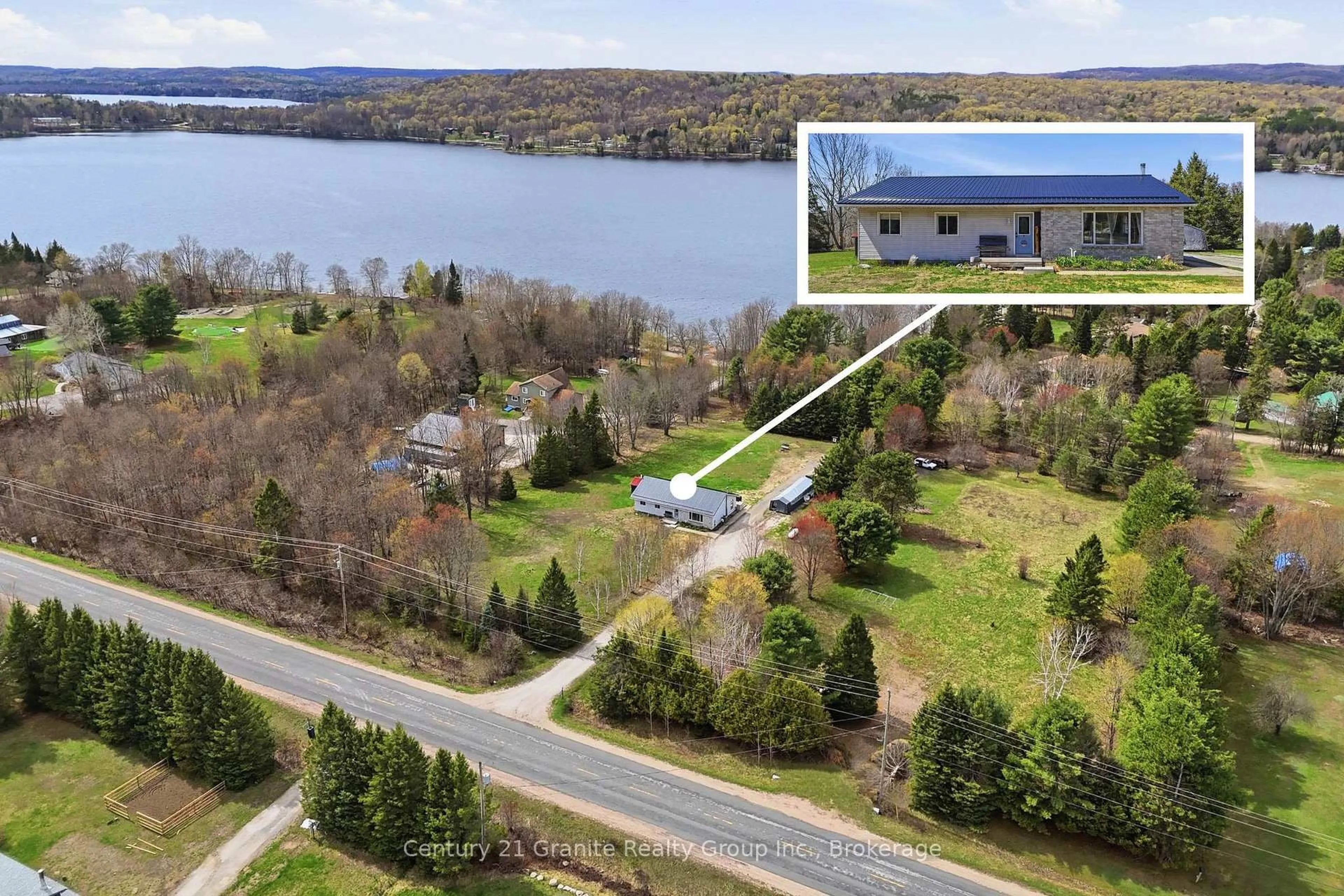 A pic from outside/outdoor area/front of a property/back of a property/a pic from drone, water/lake/river/ocean view for 1373 Eagle Lake Rd, Dysart et al Ontario K0M 1S0