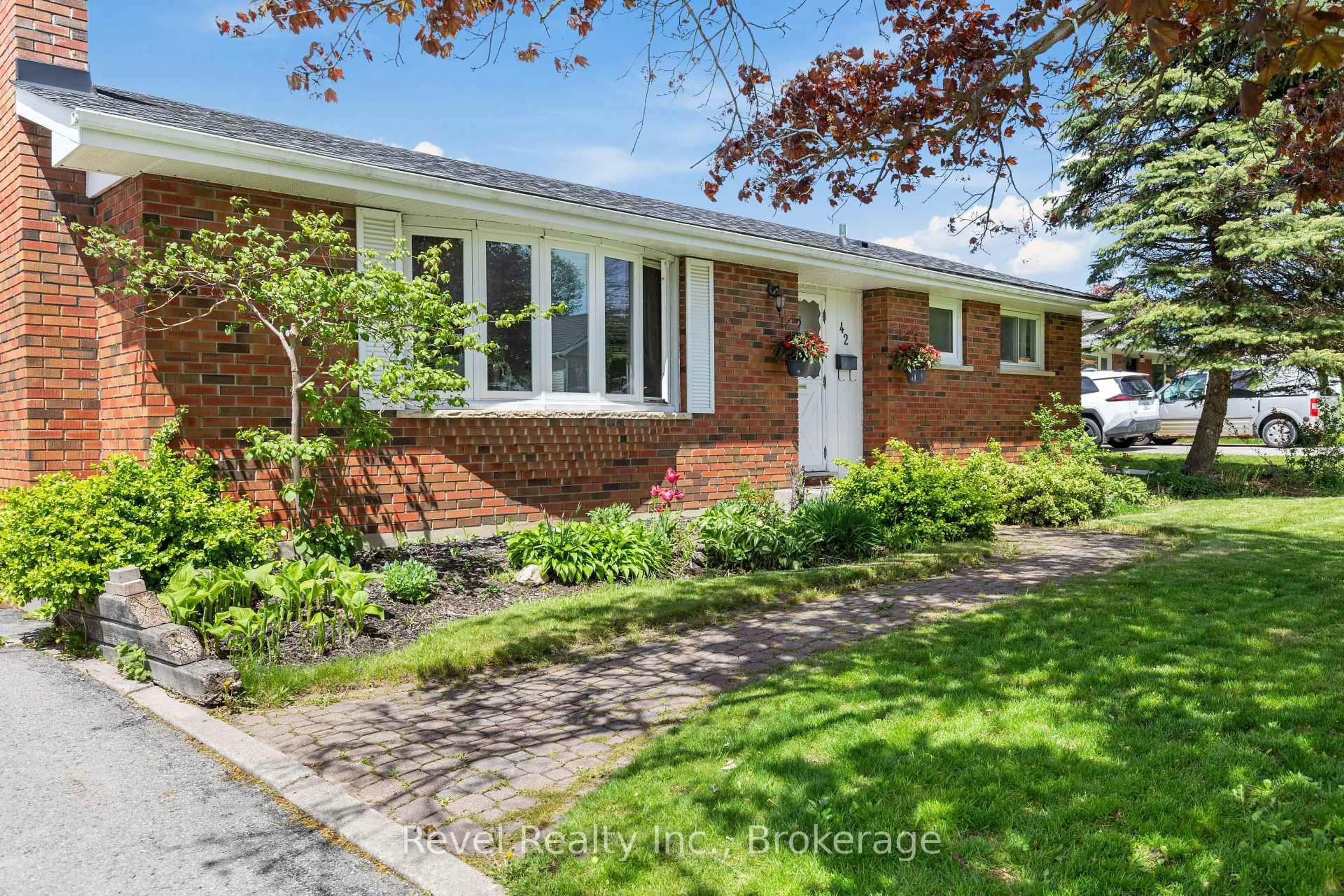 Home with brick exterior material, street for 42 Kawartha Dr, Kawartha Lakes Ontario K9V 1A5