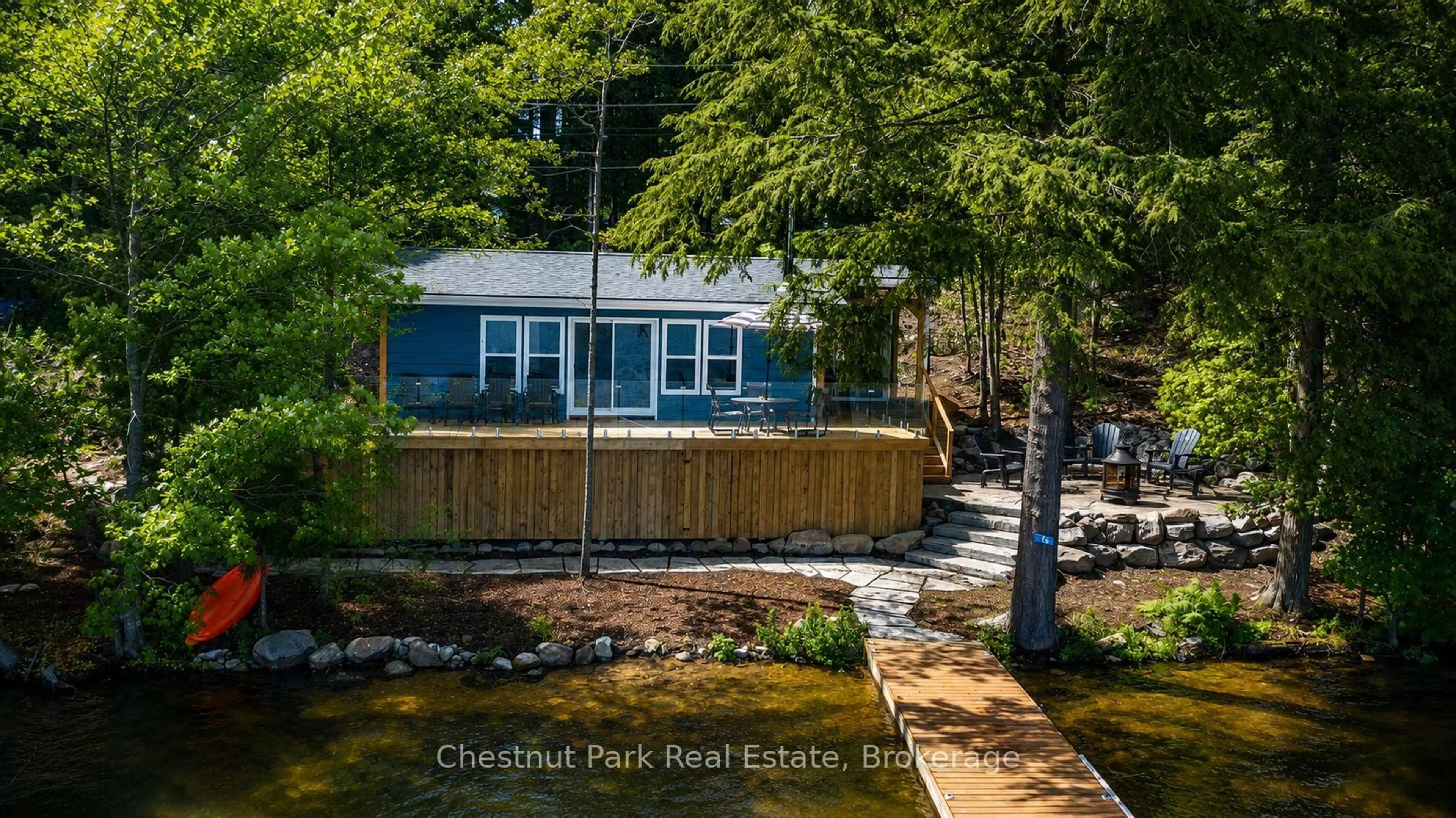 A pic from outside/outdoor area/front of a property/back of a property/a pic from drone, water/lake/river/ocean view for 76 Birch Island, Bracebridge Ontario P1L 1W8