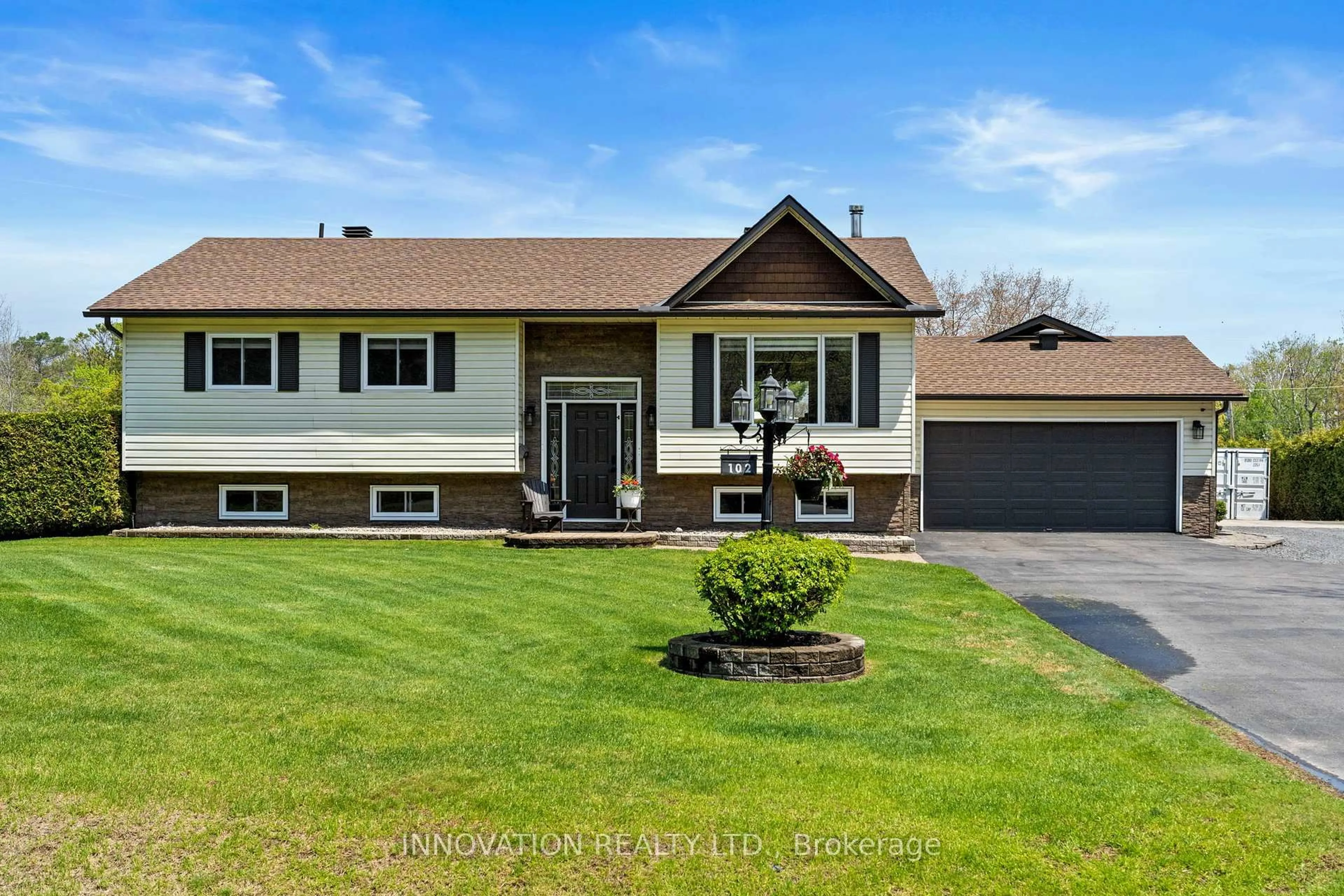Home with vinyl exterior material, street for 102 Fireside Dr, Ottawa Ontario K0A 3M0