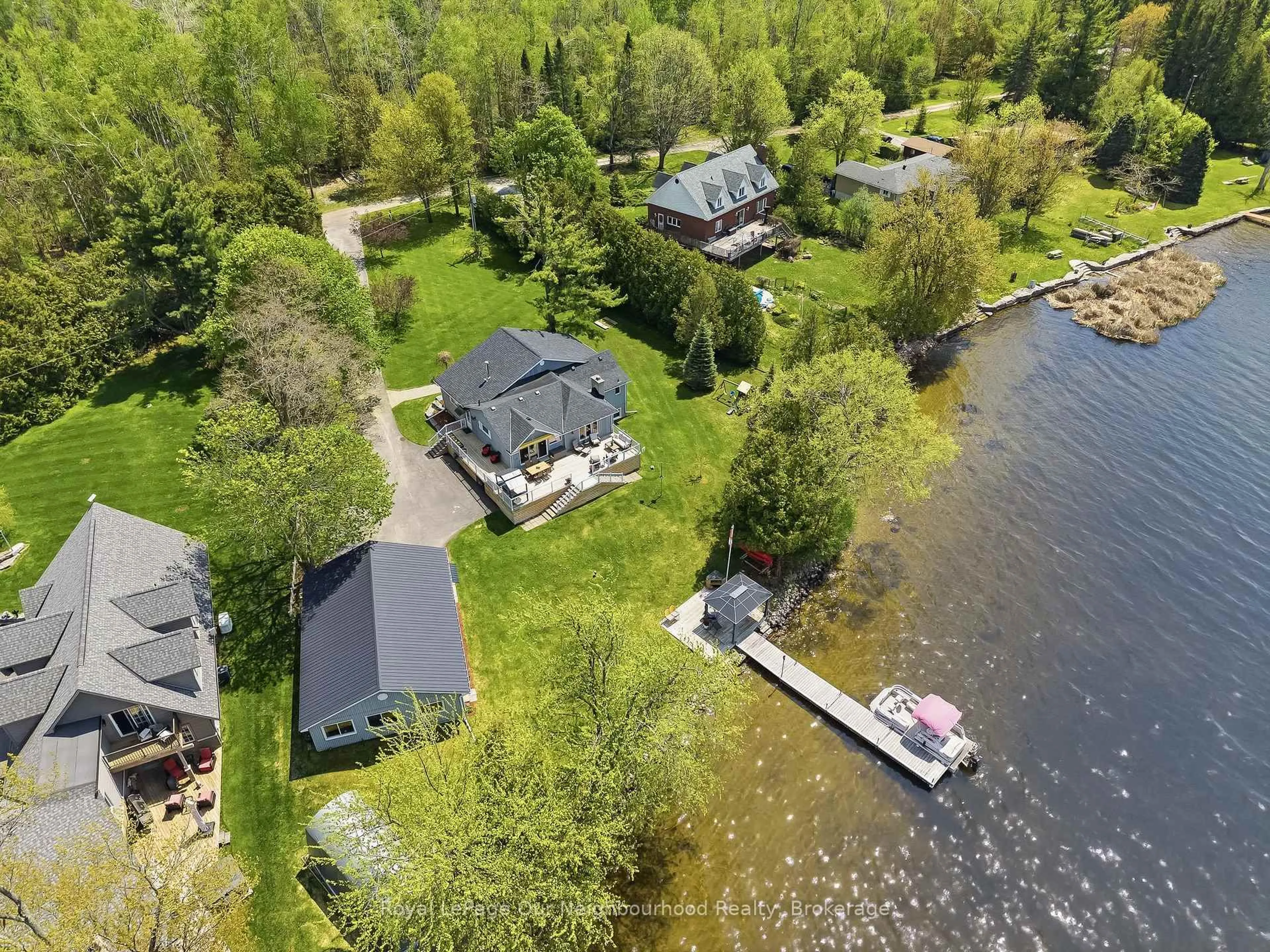 A pic from outside/outdoor area/front of a property/back of a property/a pic from drone, water/lake/river/ocean view for 1354 Island View Dr, Selwyn Ontario K0L 1T0