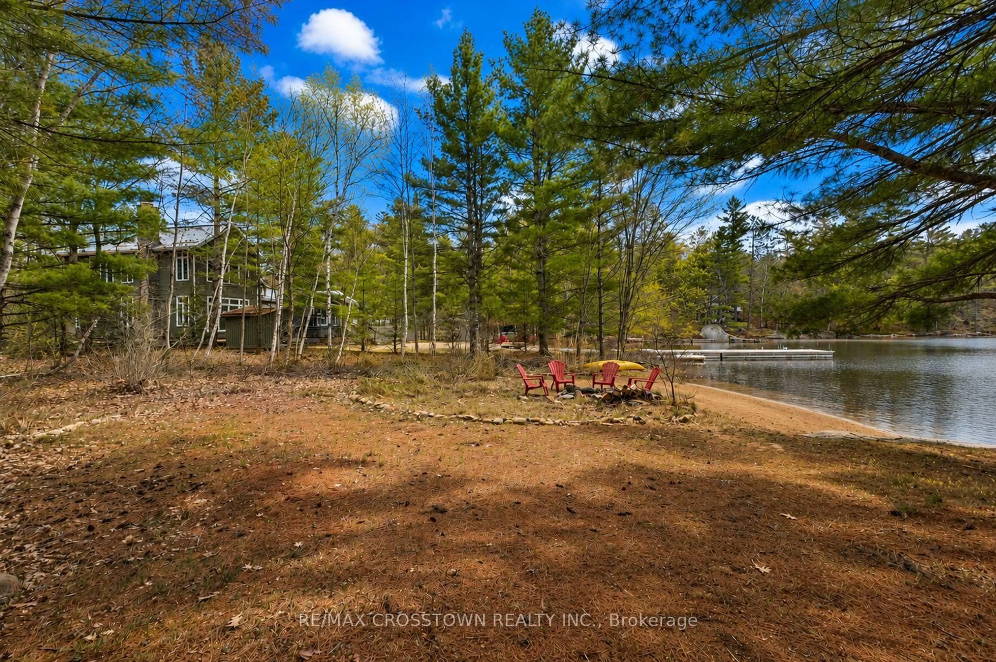 A pic from outside/outdoor area/front of a property/back of a property/a pic from drone, forest/trees view for 607 Juniper Dr, Gravenhurst Ontario P1P 1R1