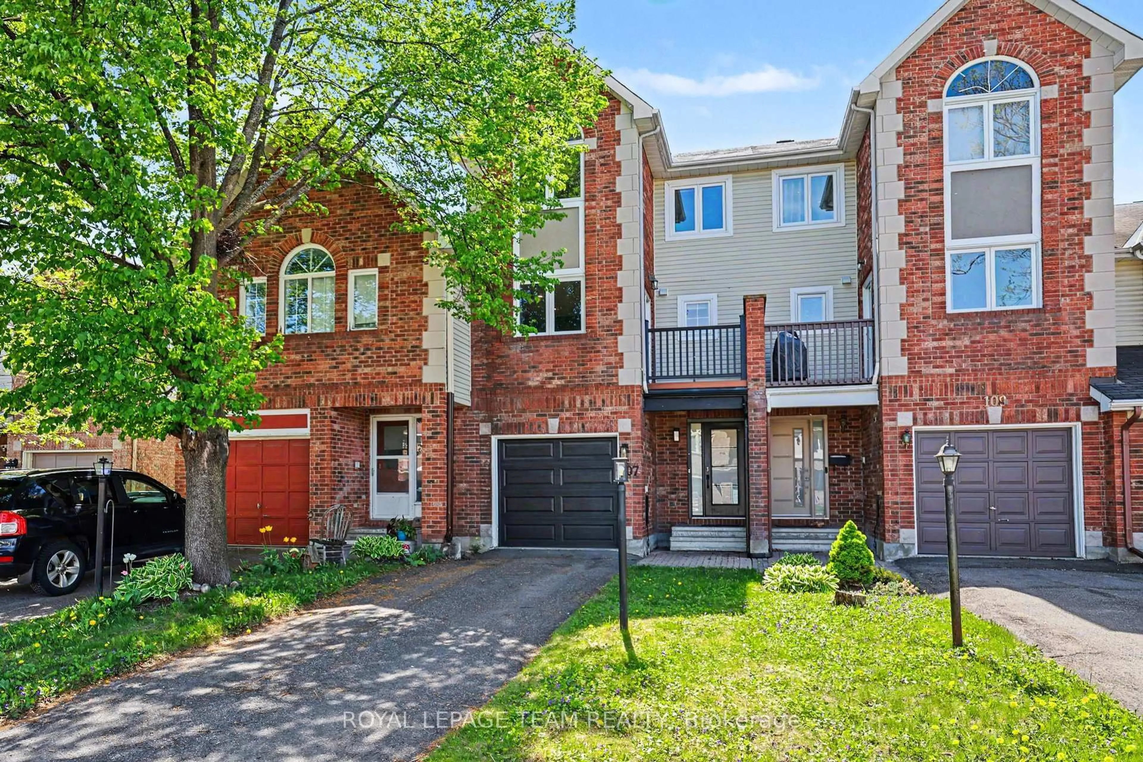 Home with brick exterior material, street for 107 Woodpark Way, Ottawa Ontario K2J 4C7