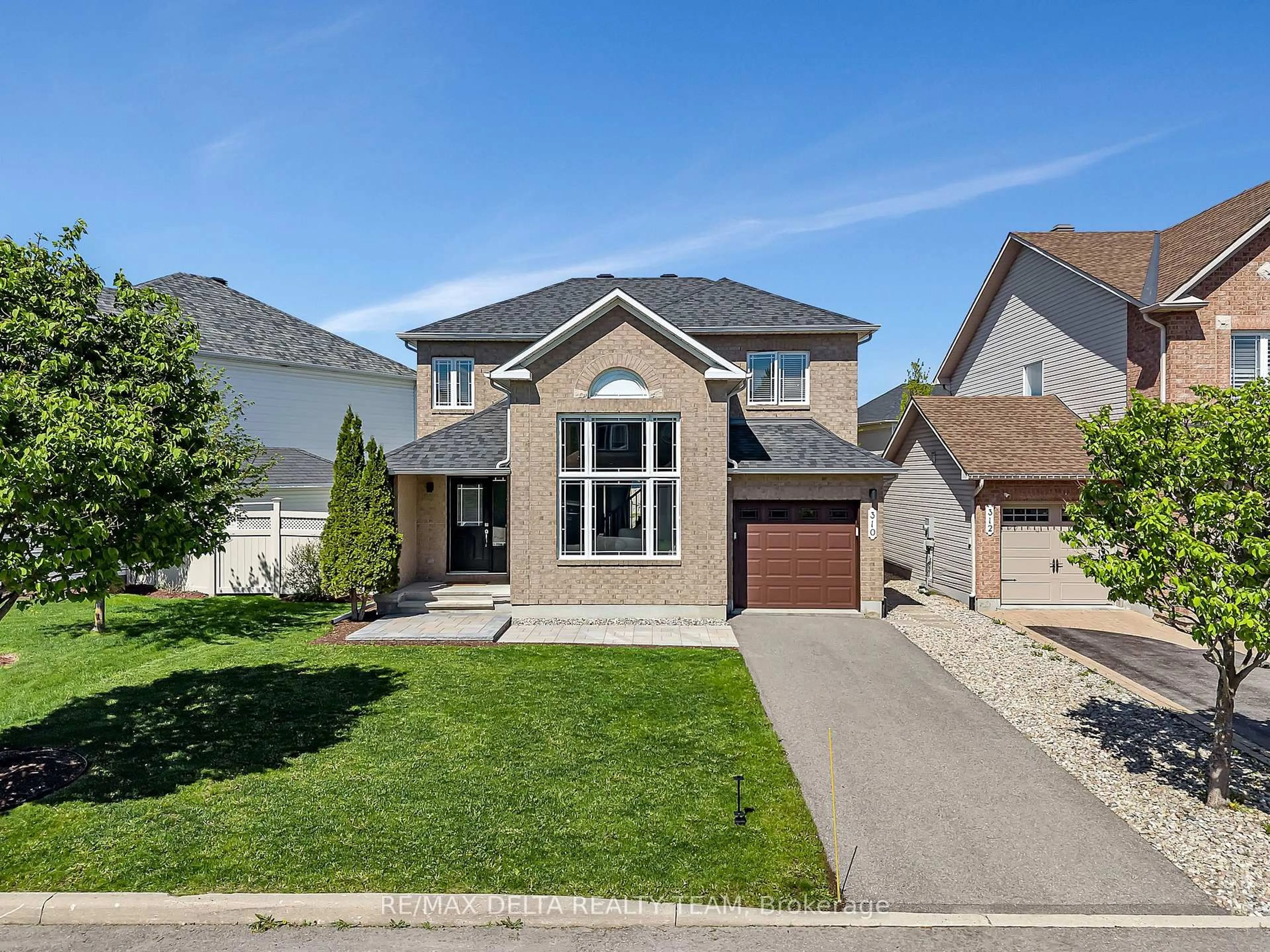 Home with brick exterior material, street for 310 Sarabella St, Ottawa Ontario K4A 0A3