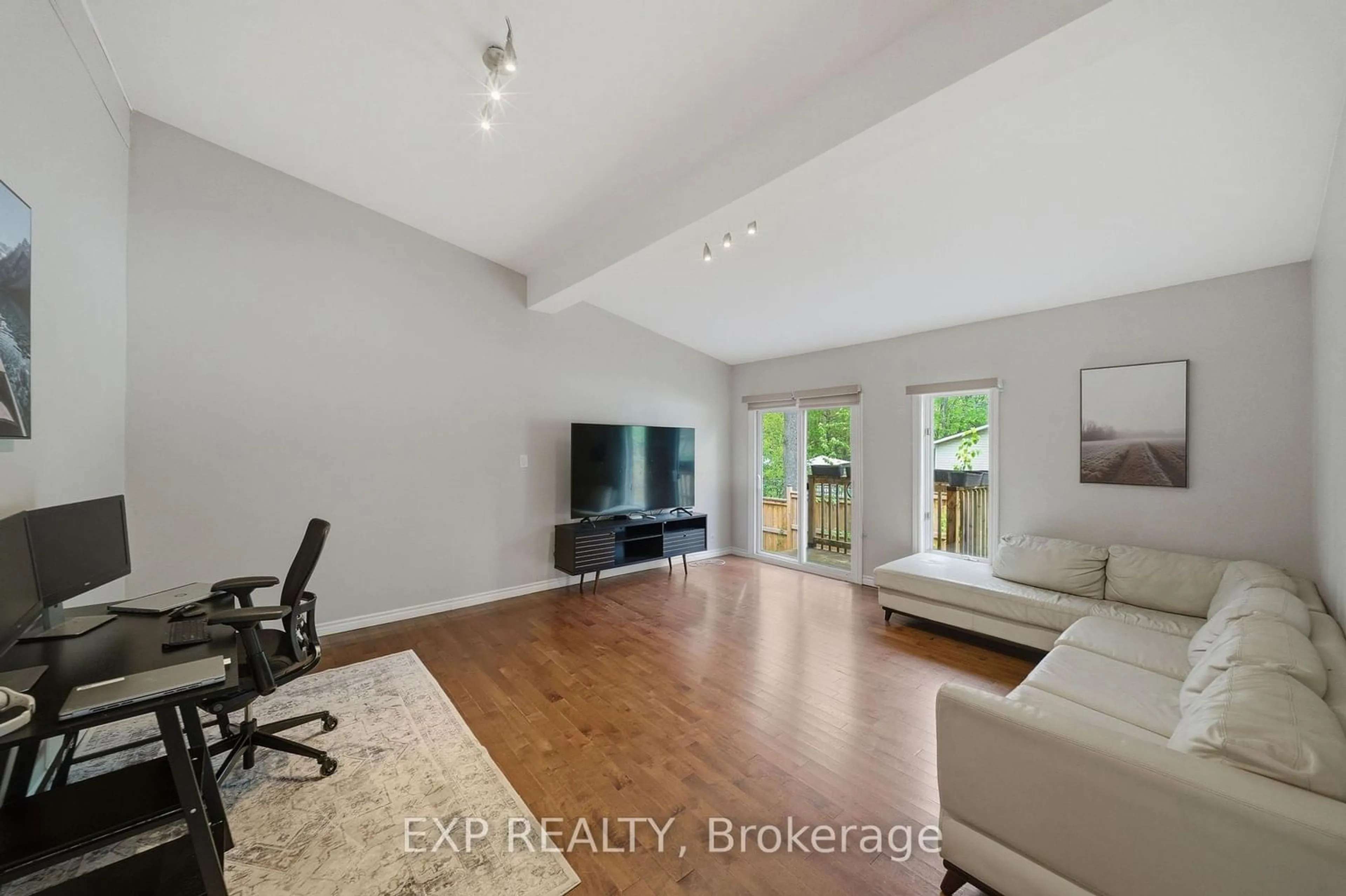 Living room with furniture, wood/laminate floor for 136 Resthaven Ave, Ottawa Ontario K0A 3M0