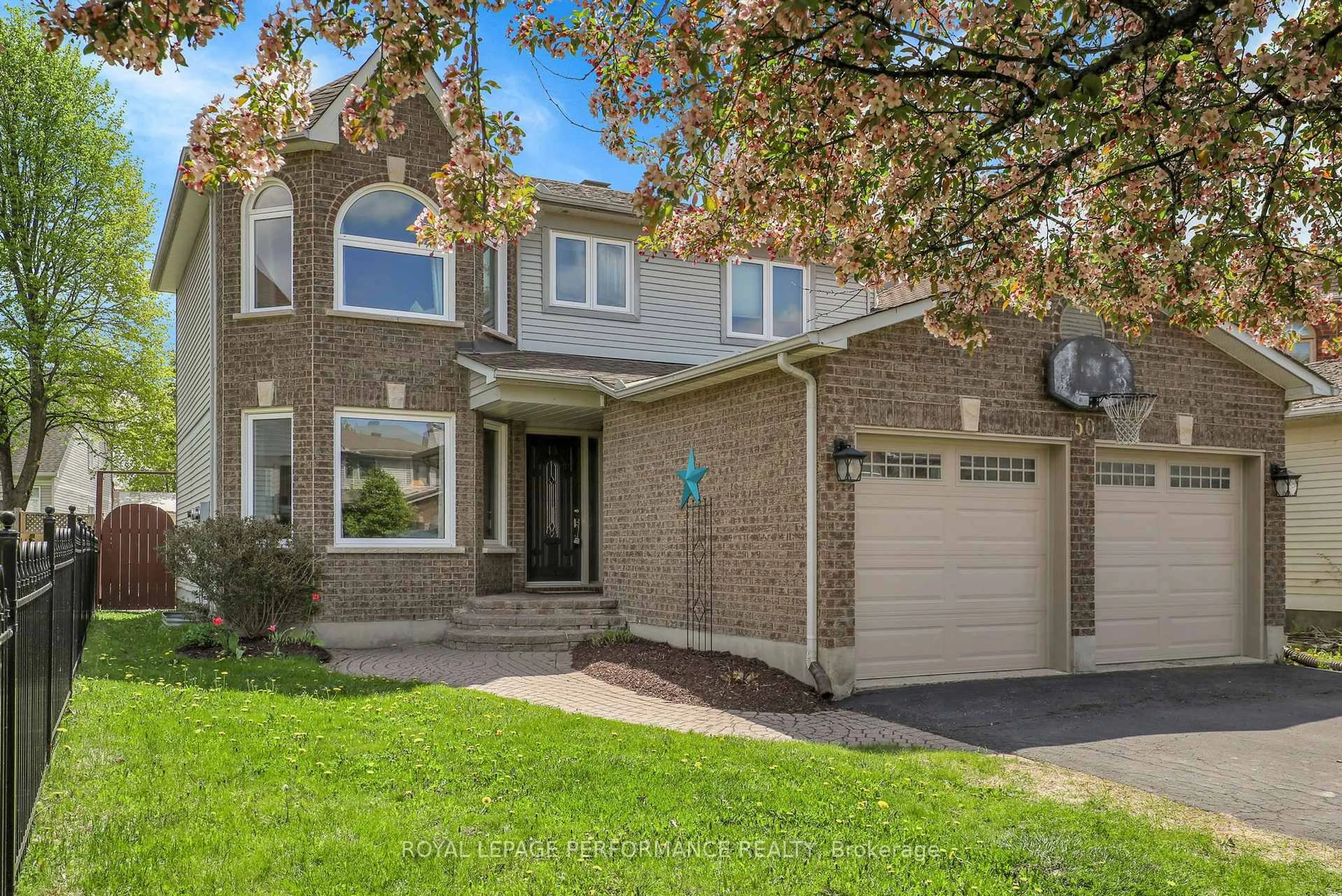 Home with brick exterior material, street for 50 Picasso Dr, Ottawa Ontario K1G 5S6