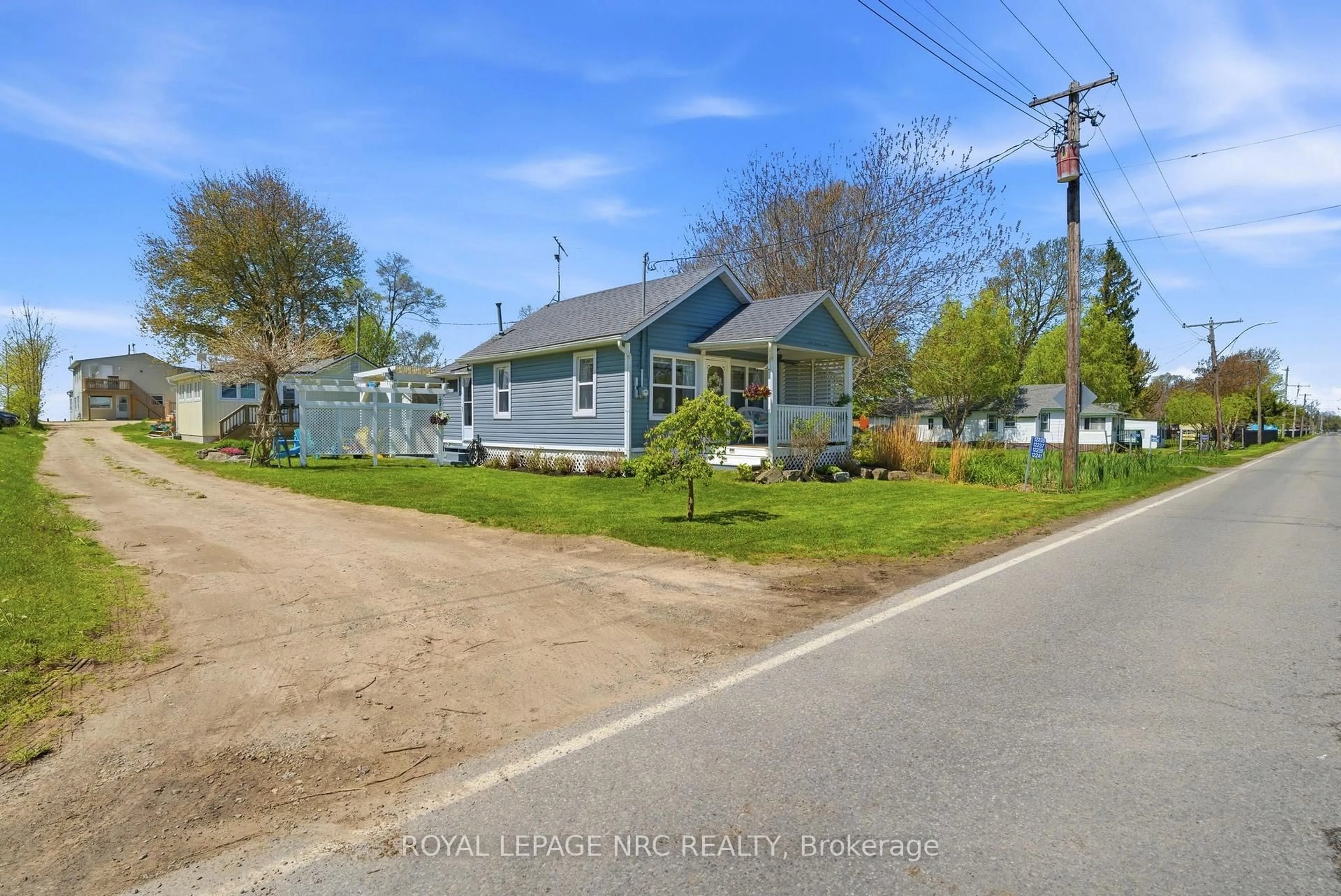 A pic from outside/outdoor area/front of a property/back of a property/a pic from drone, street for 12235 Lakeshore Rd, Wainfleet Ontario L0S 1V0