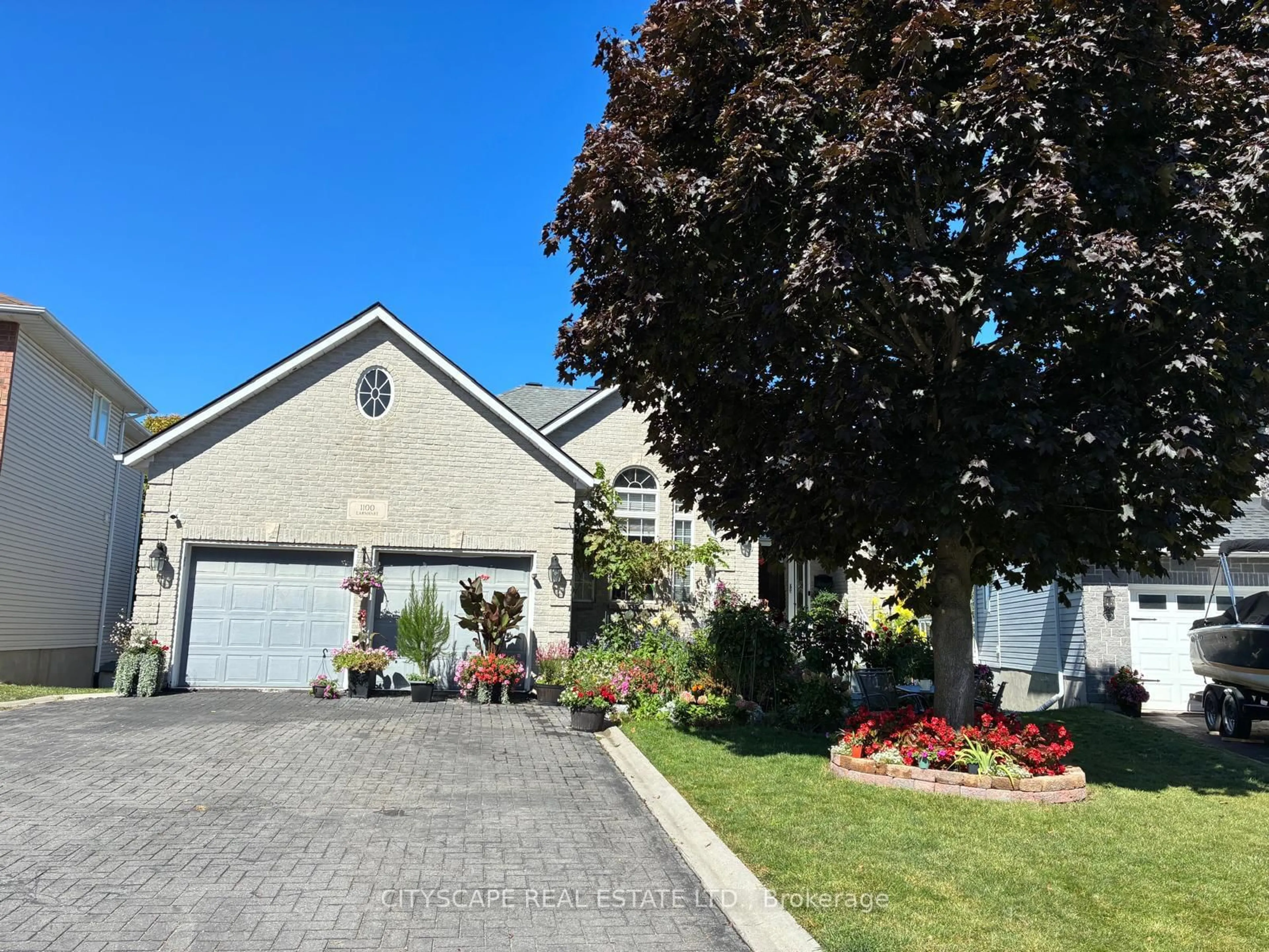 A pic from outside/outdoor area/front of a property/back of a property/a pic from drone, street for 1100 Earnhart St, Kingston Ontario K7P 3C2