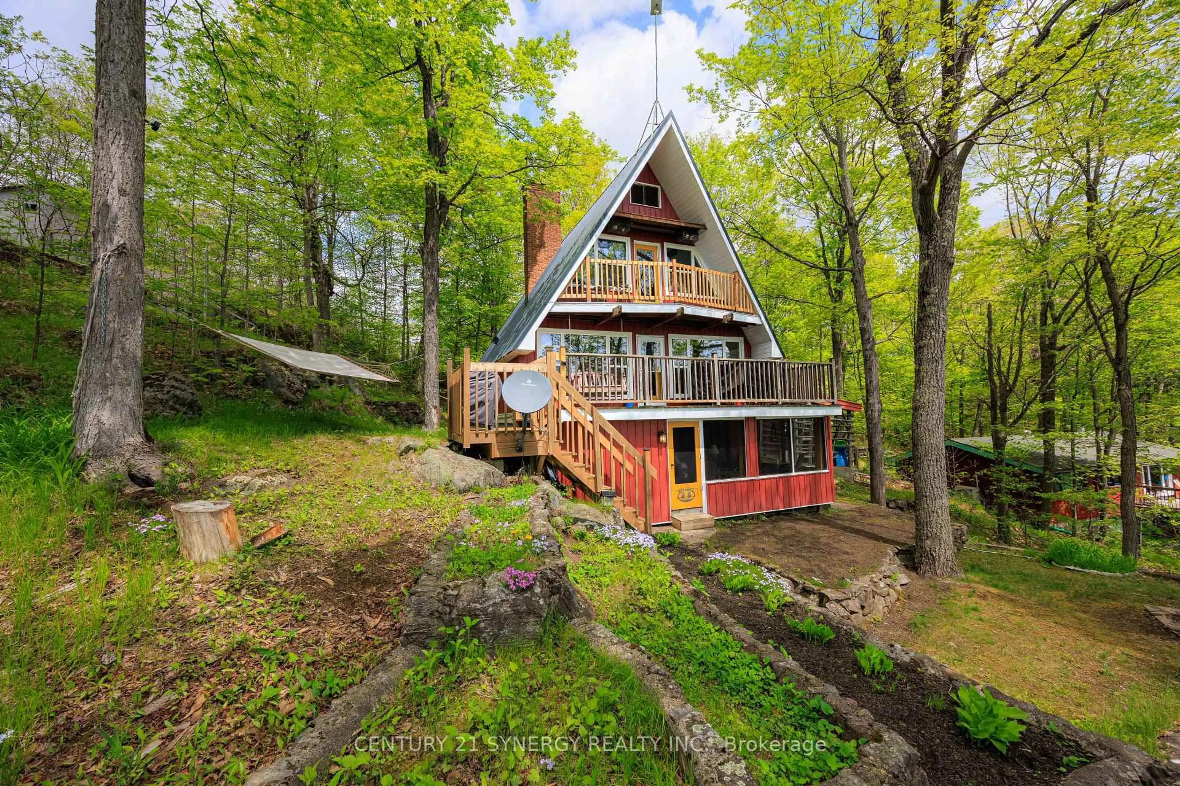 A pic from outside/outdoor area/front of a property/back of a property/a pic from drone, water/lake/river/ocean view for 281 Pine Shores Lane, Tichborne Ontario K0H 2V0