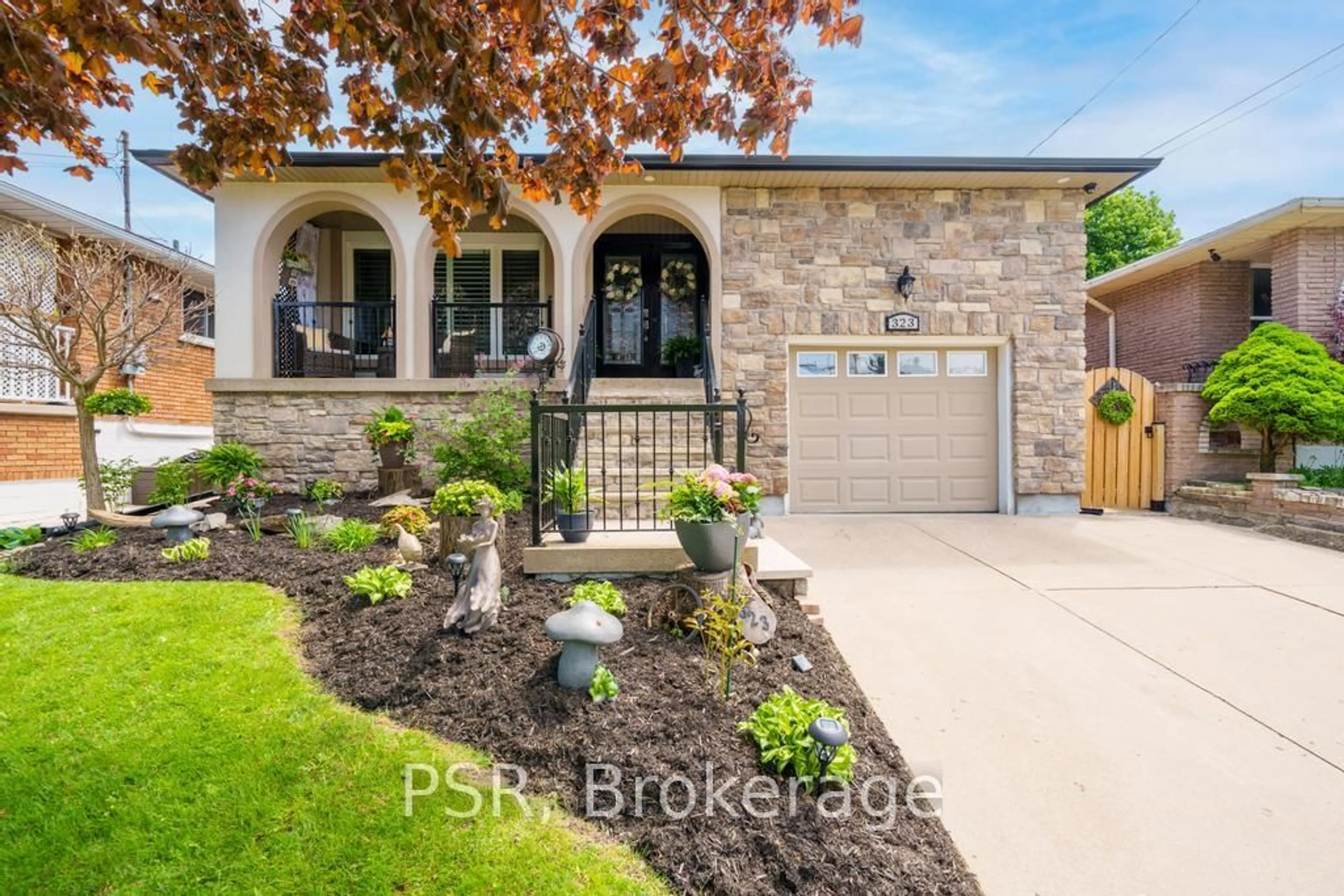 Home with brick exterior material, street for 323 Queen Victoria Dr, Hamilton Ontario L8W 1G6