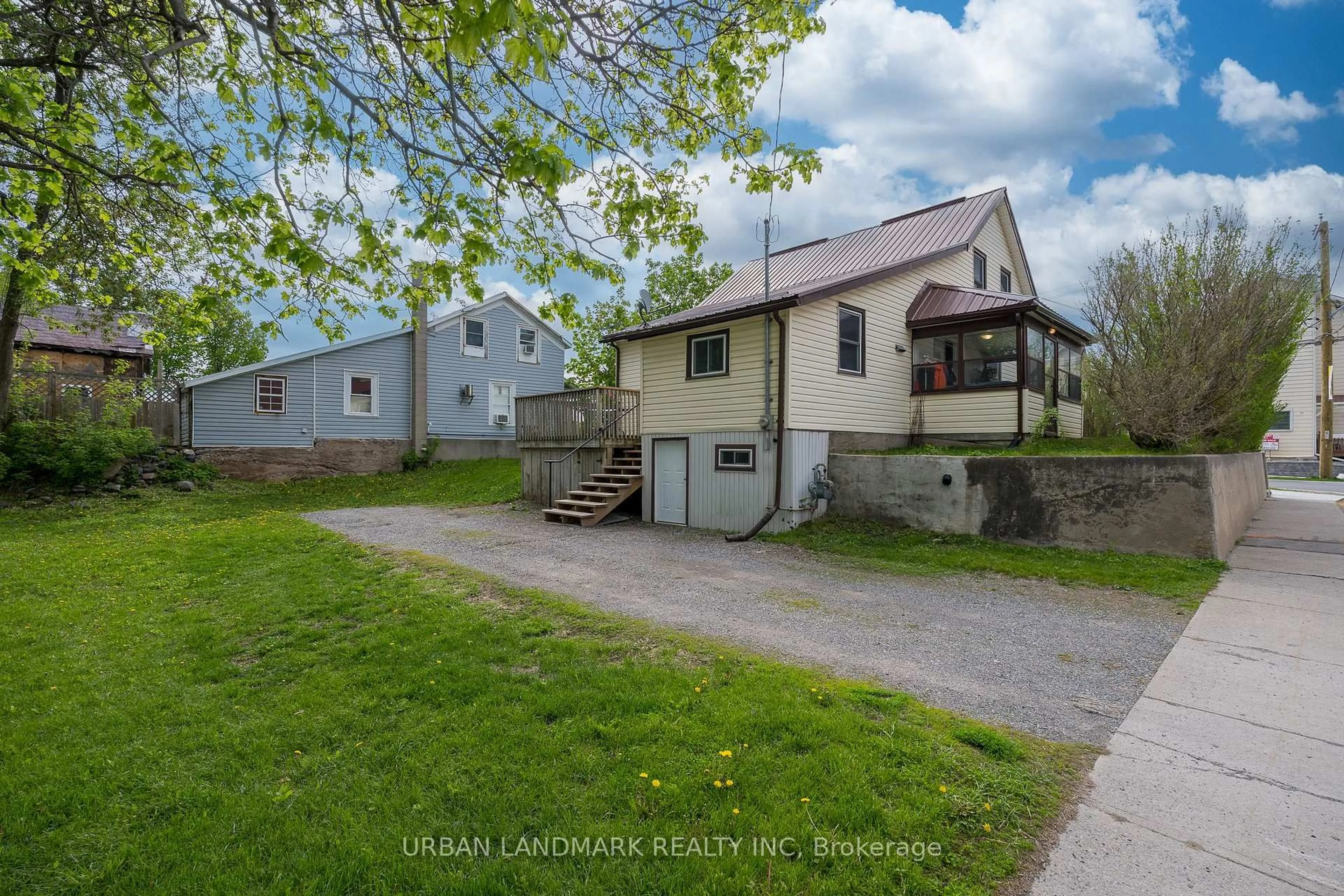 A pic from outside/outdoor area/front of a property/back of a property/a pic from drone, street for 106 St Lawrence St, Madoc Ontario K0K 2K0