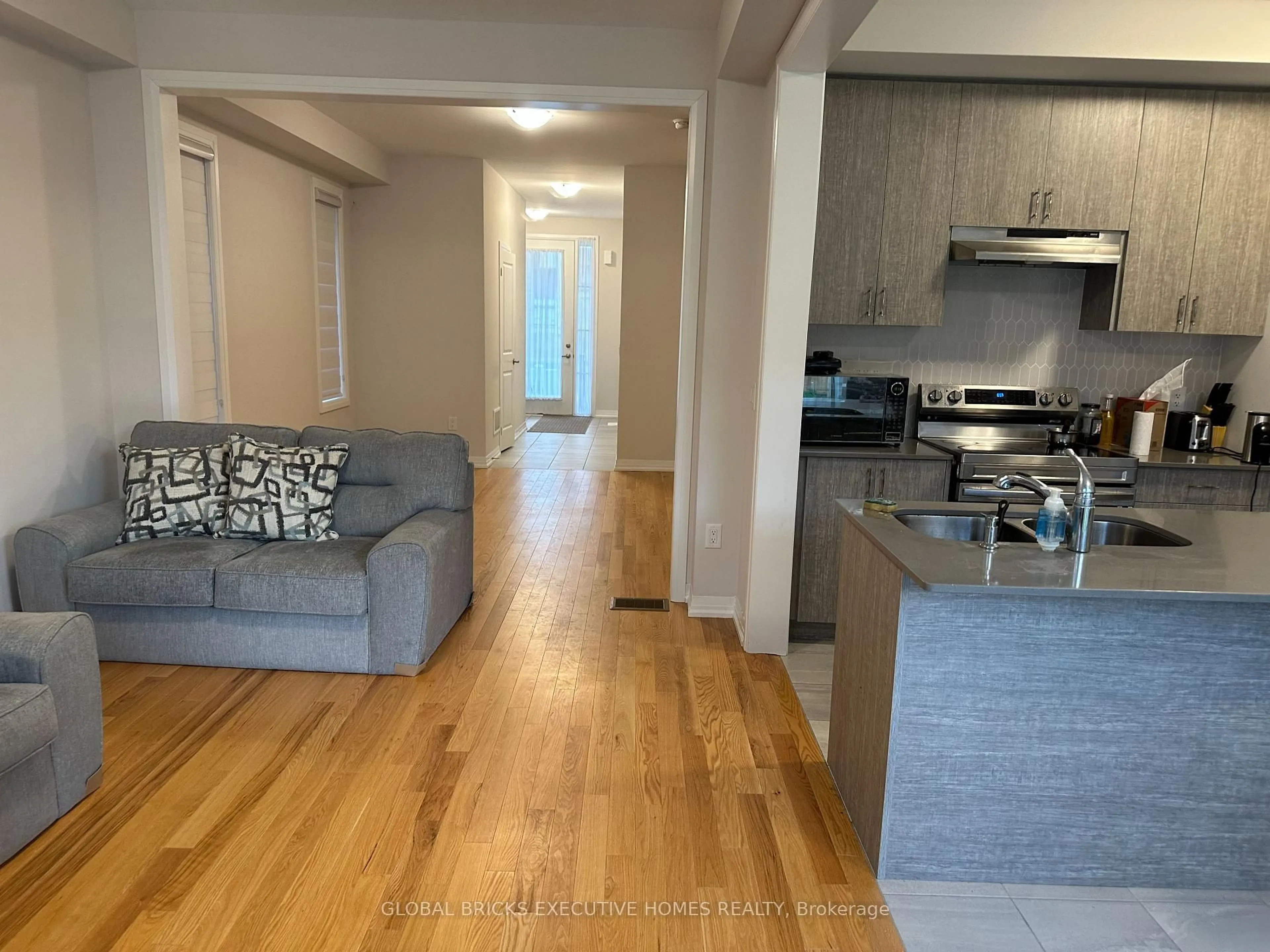 Open concept kitchen, wood/laminate floor for 20 Blacklock St, Cambridge Ontario N1S 0E2