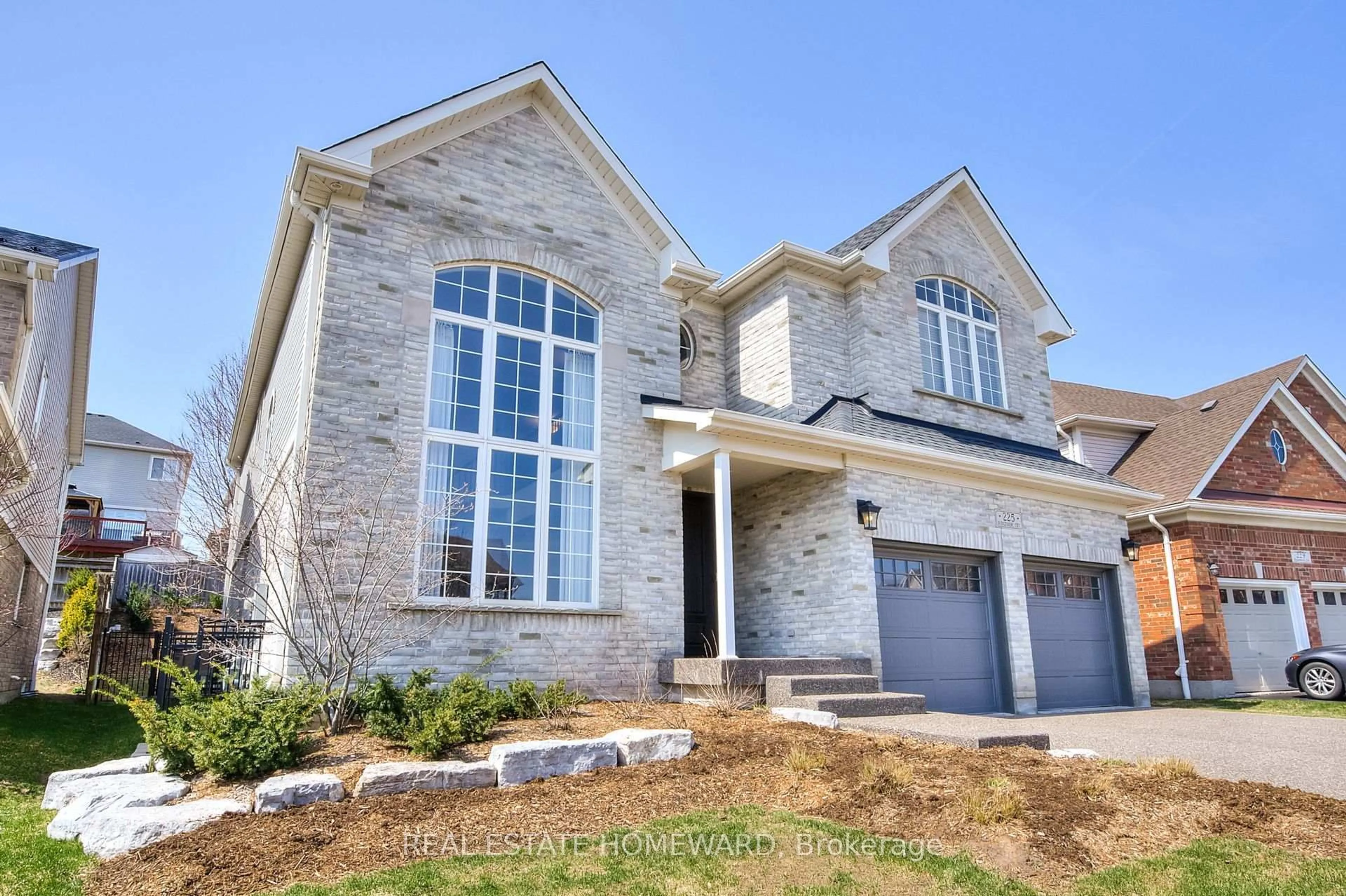 Home with brick exterior material, street for 225 Ridgemere Crt, Kitchener Ontario N2P 2V5