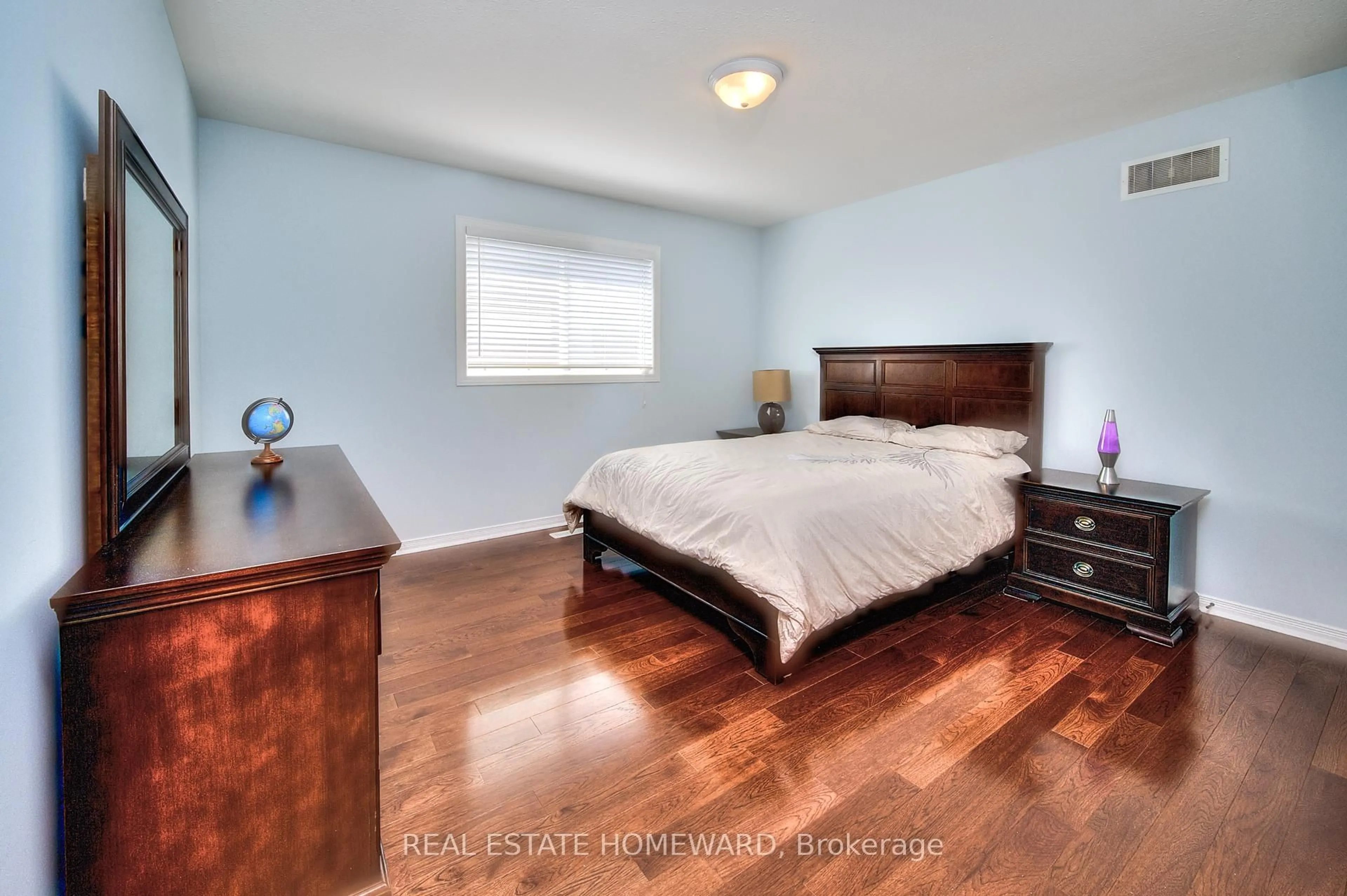 Bedroom with bed, wood/laminate floor for 225 Ridgemere Crt, Kitchener Ontario N2P 2V5