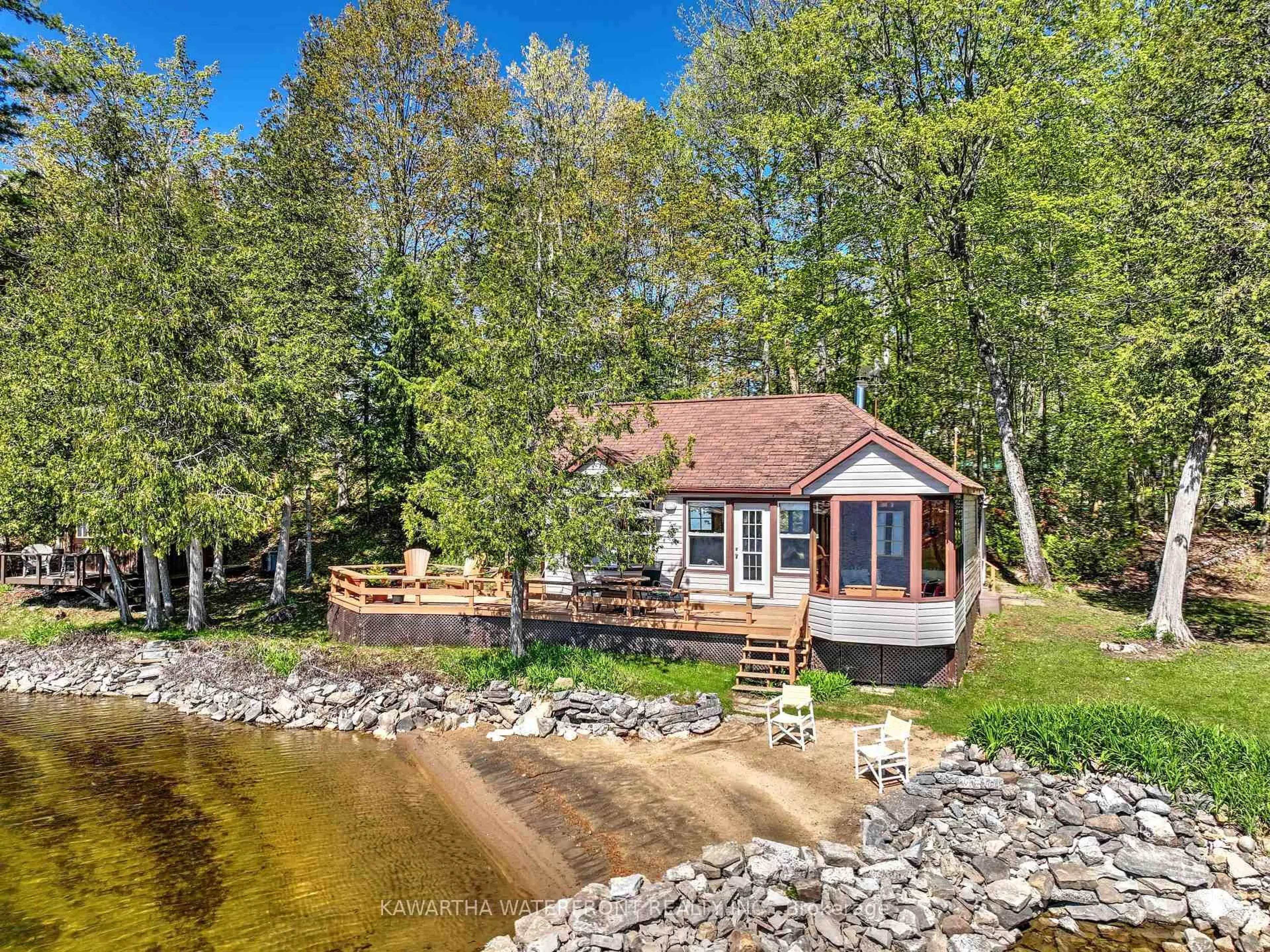A pic from outside/outdoor area/front of a property/back of a property/a pic from drone, water/lake/river/ocean view for 103 Shadow Lake 2 Rd, Kawartha Lakes Ontario K0M 2L0