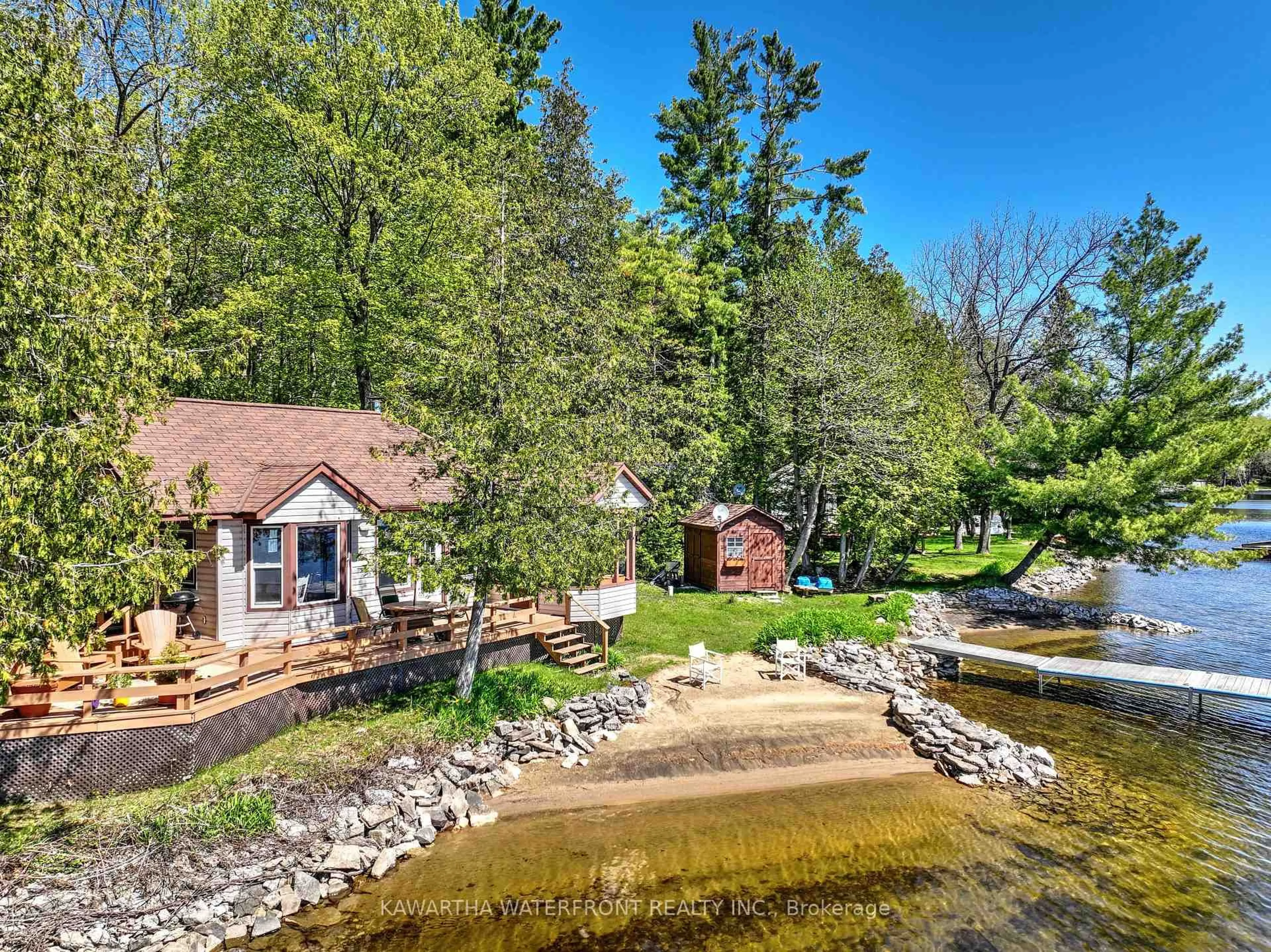 A pic from outside/outdoor area/front of a property/back of a property/a pic from drone, water/lake/river/ocean view for 103 Shadow Lake 2 Rd, Kawartha Lakes Ontario K0M 2L0