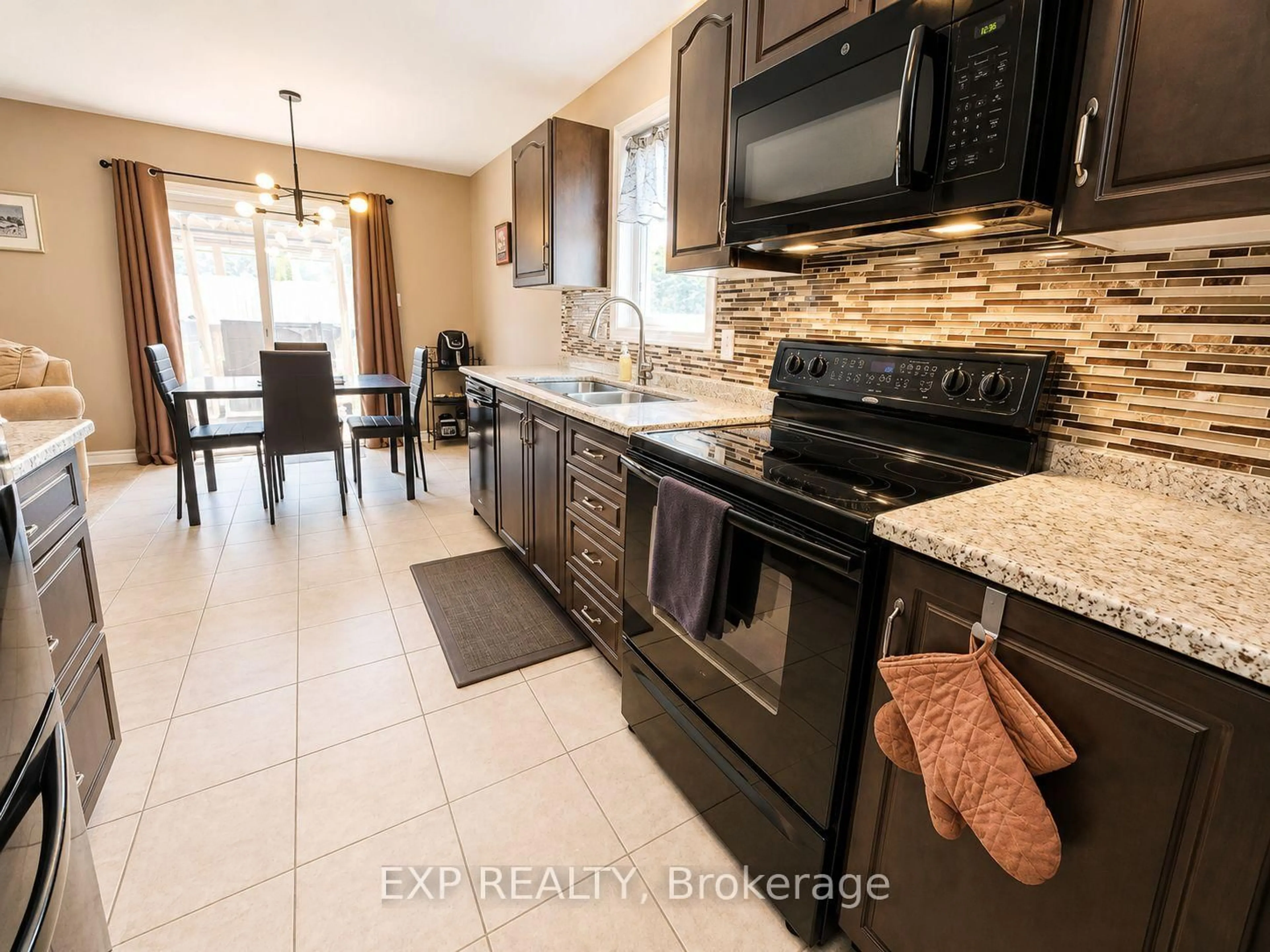 Open concept kitchen, ceramic/tile floor for 107 Ferrara Dr, Smiths Falls Ontario K7A 0A2