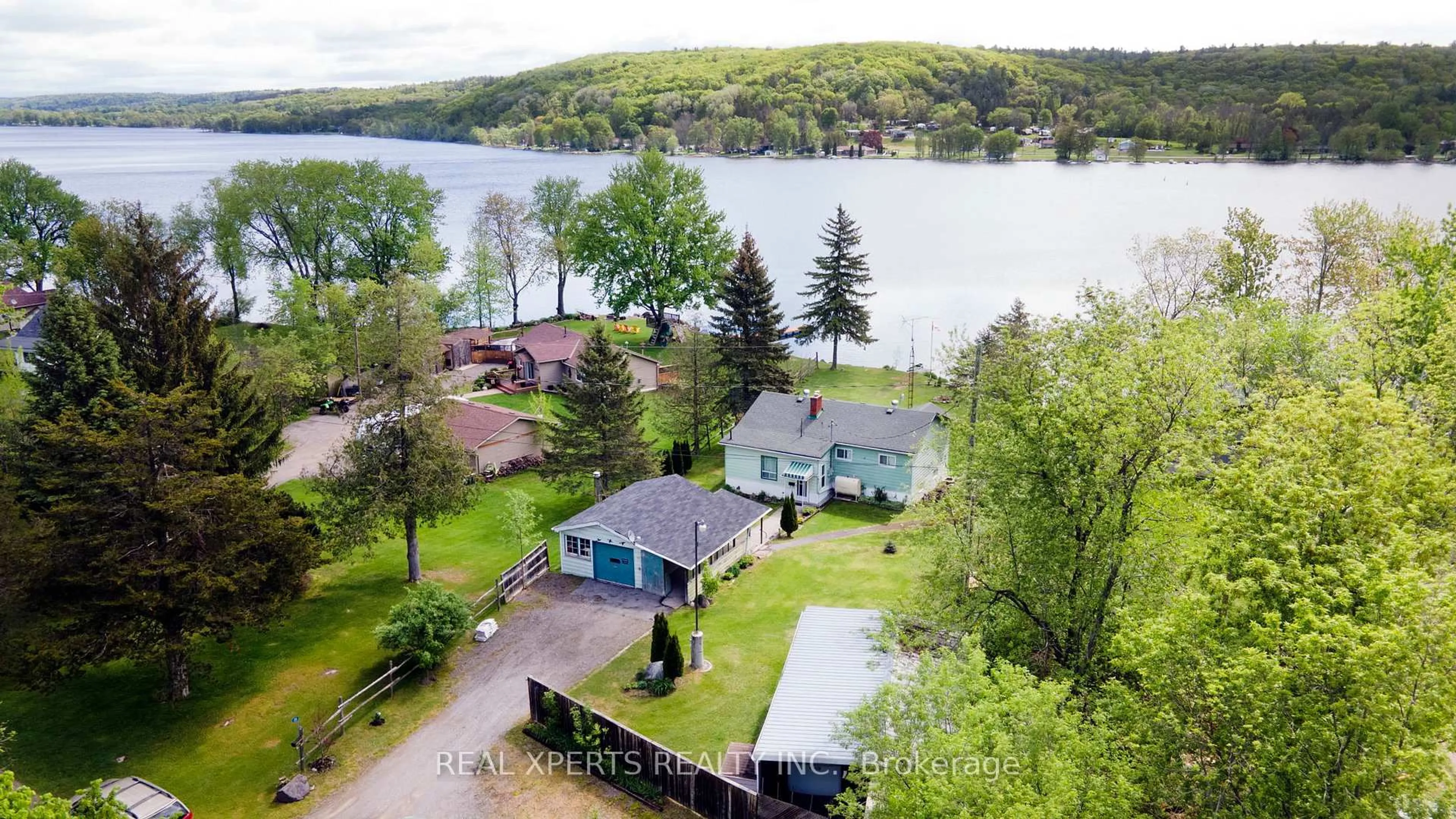 A pic from outside/outdoor area/front of a property/back of a property/a pic from drone, water/lake/river/ocean view for 29 Prior Lane, Hastings Ontario K0K 2C0