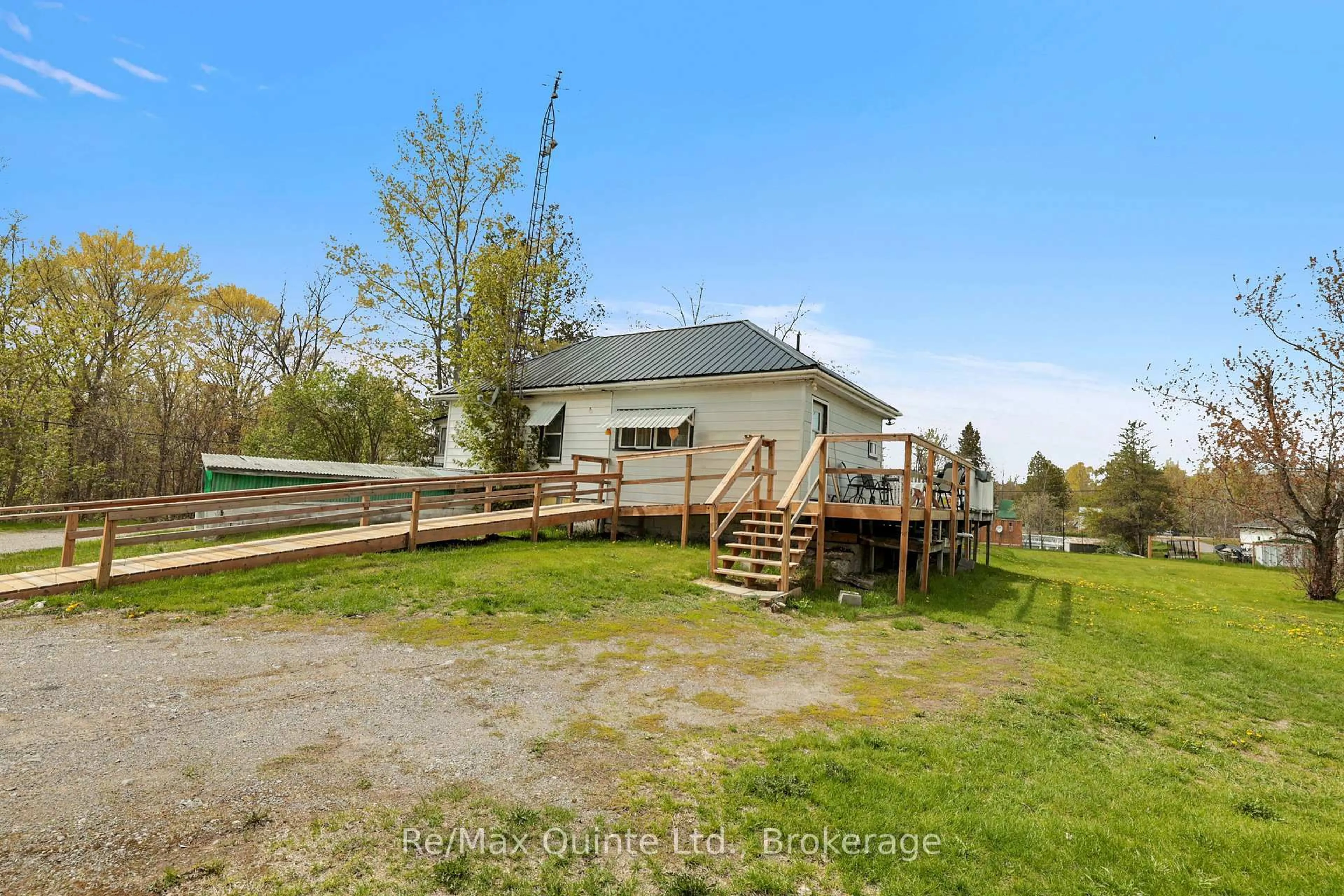 A pic from outside/outdoor area/front of a property/back of a property/a pic from drone, water/lake/river/ocean view for 13 Douglas Rd, Madoc Ontario K0K 2K0