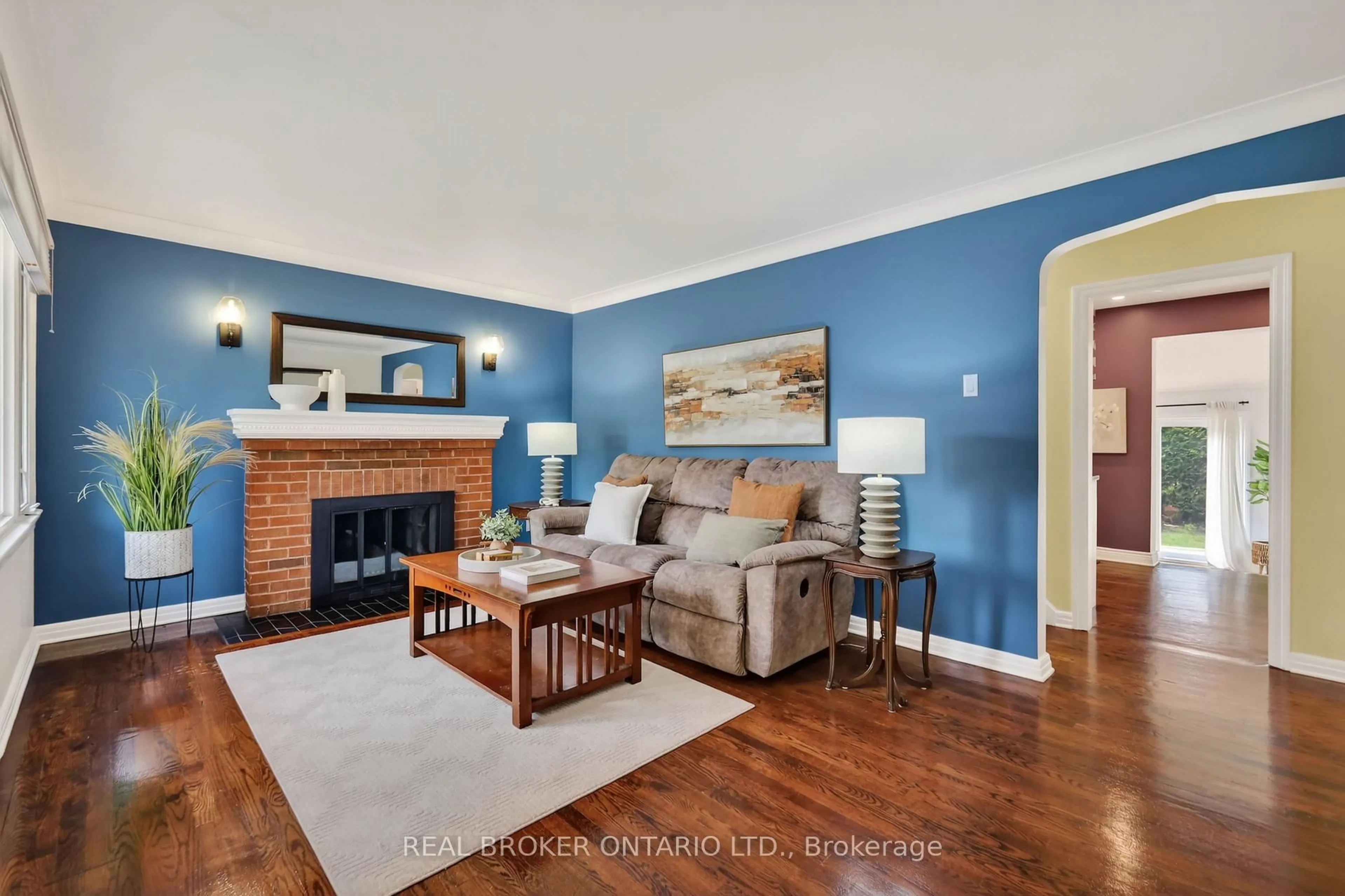 Living room with furniture, wood/laminate floor for 1572 Dorion Ave, Ottawa Ontario K1G 0J6