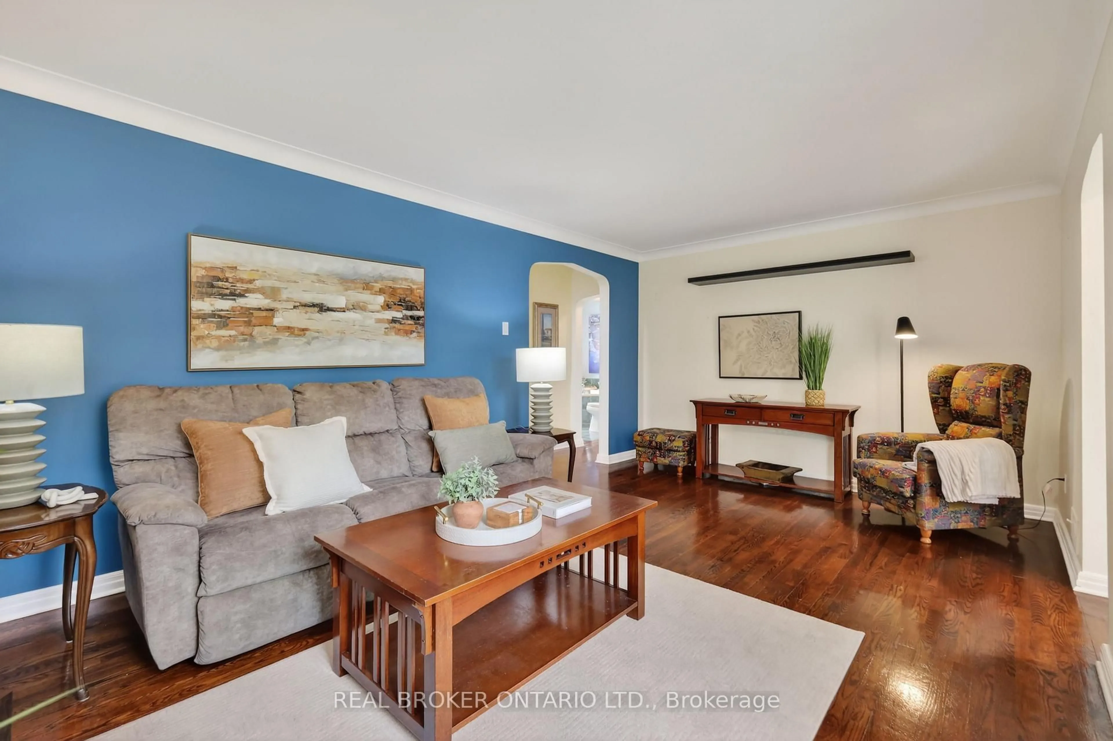 Living room with furniture, wood/laminate floor for 1572 Dorion Ave, Ottawa Ontario K1G 0J6