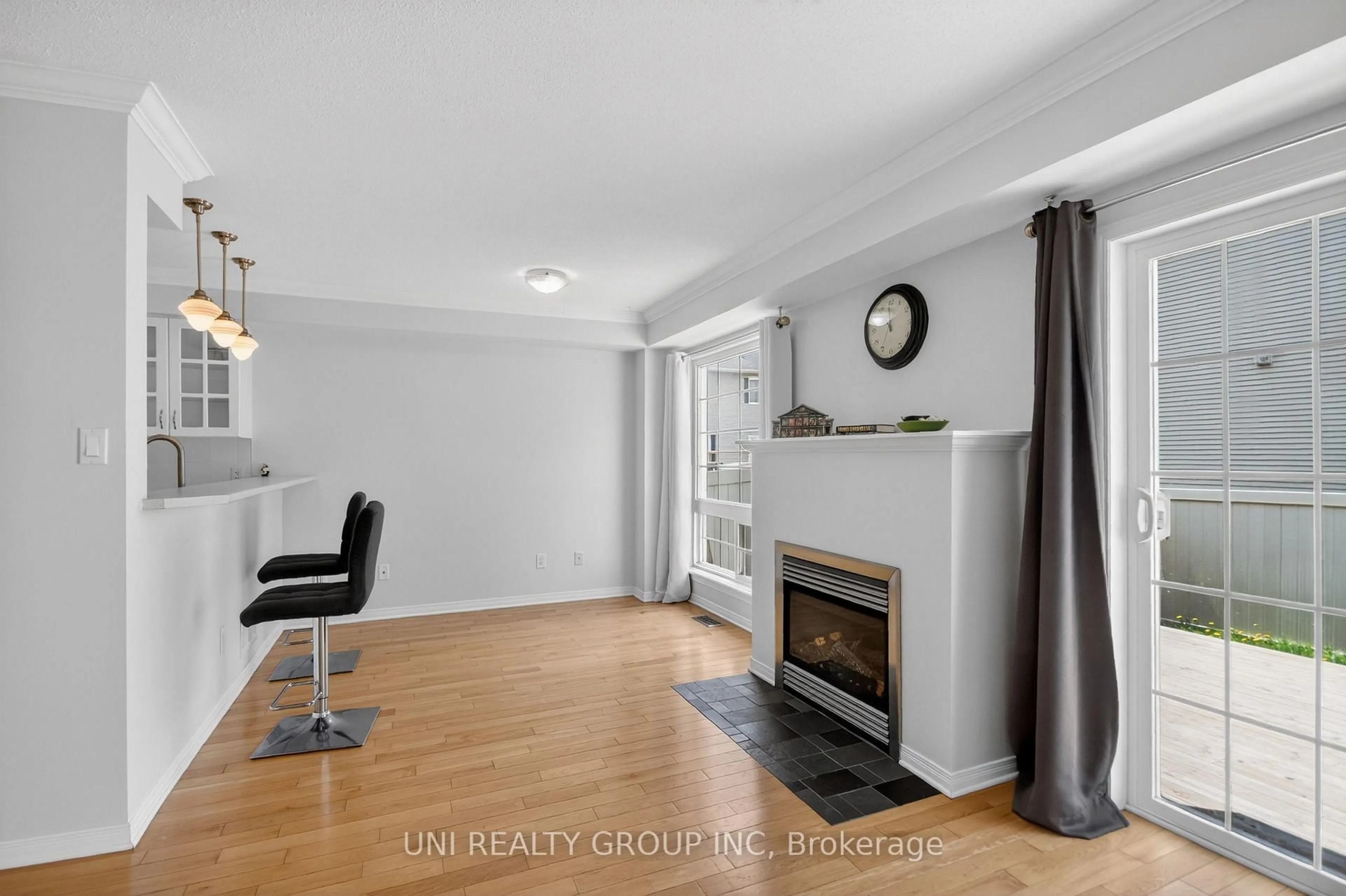 Living room with furniture, wood/laminate floor for 546 Ashbourne Cres, Ottawa Ontario K2J 0P6