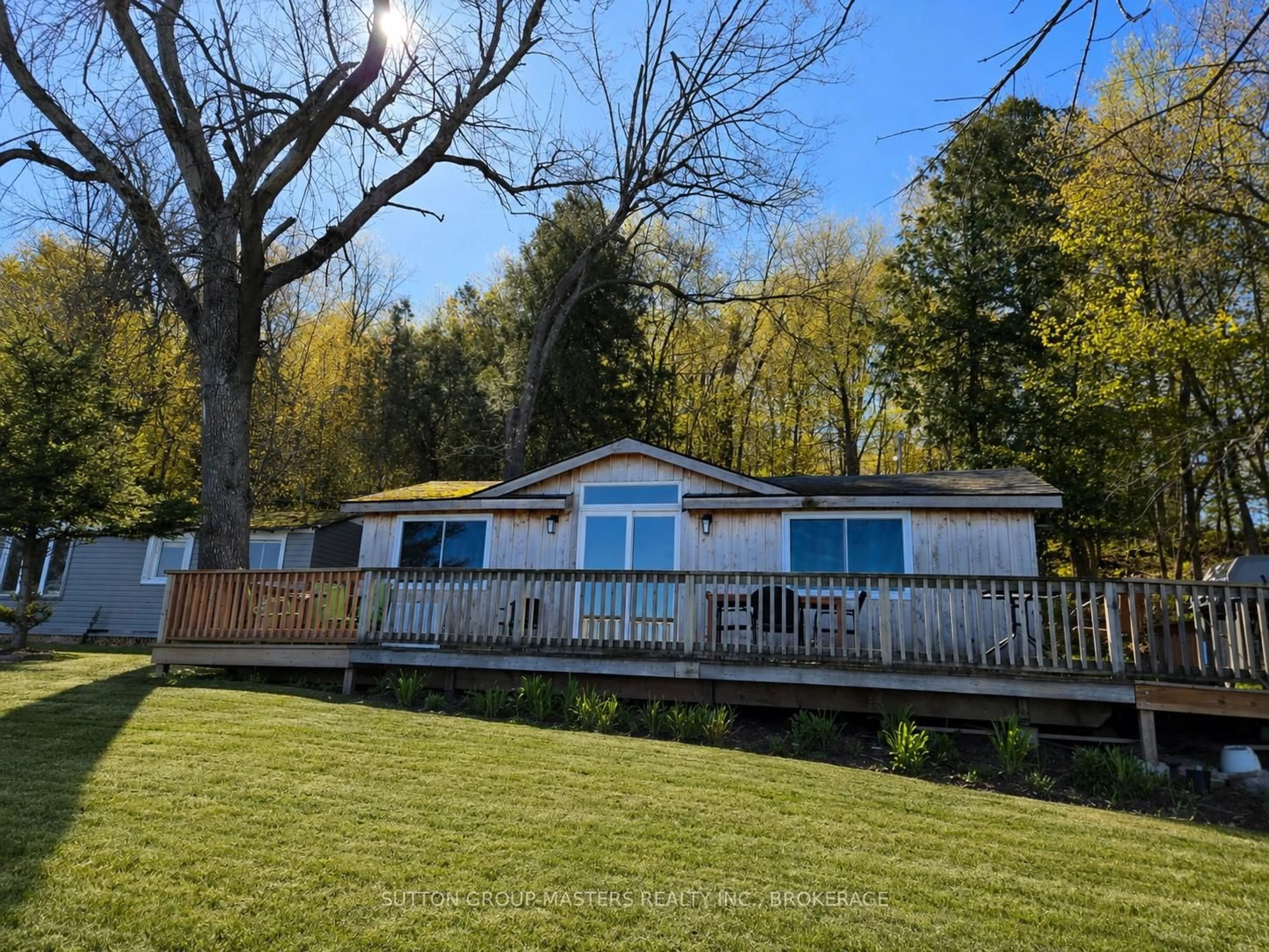 A pic from outside/outdoor area/front of a property/back of a property/a pic from drone, water/lake/river/ocean view for 46 Alarie Lane, Wolfe Island Ontario K0H 2Y0